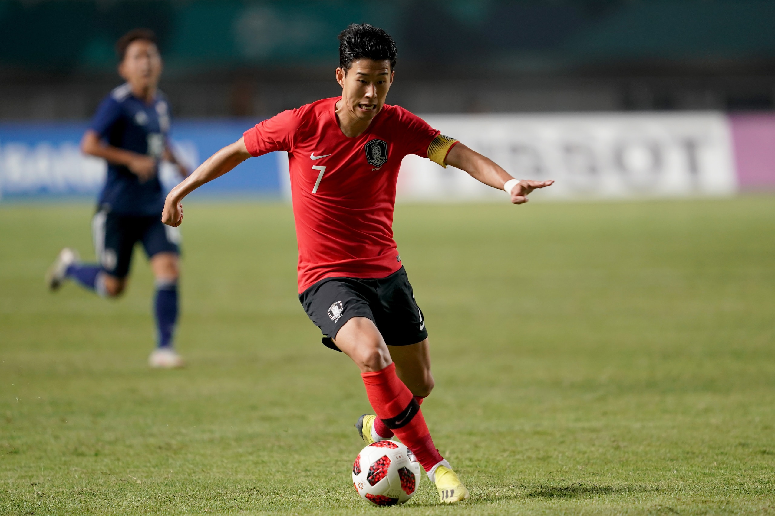 JAKARTA, INDONESIA - SEPTEMBER 01: Son Heung Min of South Korea in action during the Men's Football gold medal match between South Korea and Japan at the Pakan Sari Stadium on day fourteen of the 18th Asian Games on September 1, 2018 in Jakarta, Indonesi JAKARTA, INDONESIA - SEPTEMBER 01: Son Heung Min of South Korea in action during the Men's Football gold medal match between South Korea and Japan at the Pakan Sari Stadium on day fourteen of the 18th Asian Games on September 1, 2018 in Jakarta, Indonesi