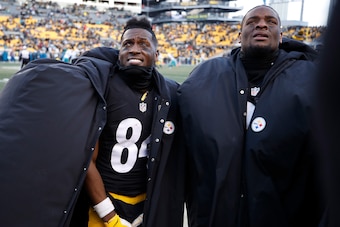 PITTSBURGH, PA - JANUARY 08:  Antonio Brown #84 and Le'Veon Bell #26 of the Pittsburgh Steelers are seen on the sidelines during the fourth quarter against the Miami Dolphins in the AFC Wild Card game at Heinz Field on January 8, 2017 in Pittsburgh, Penns