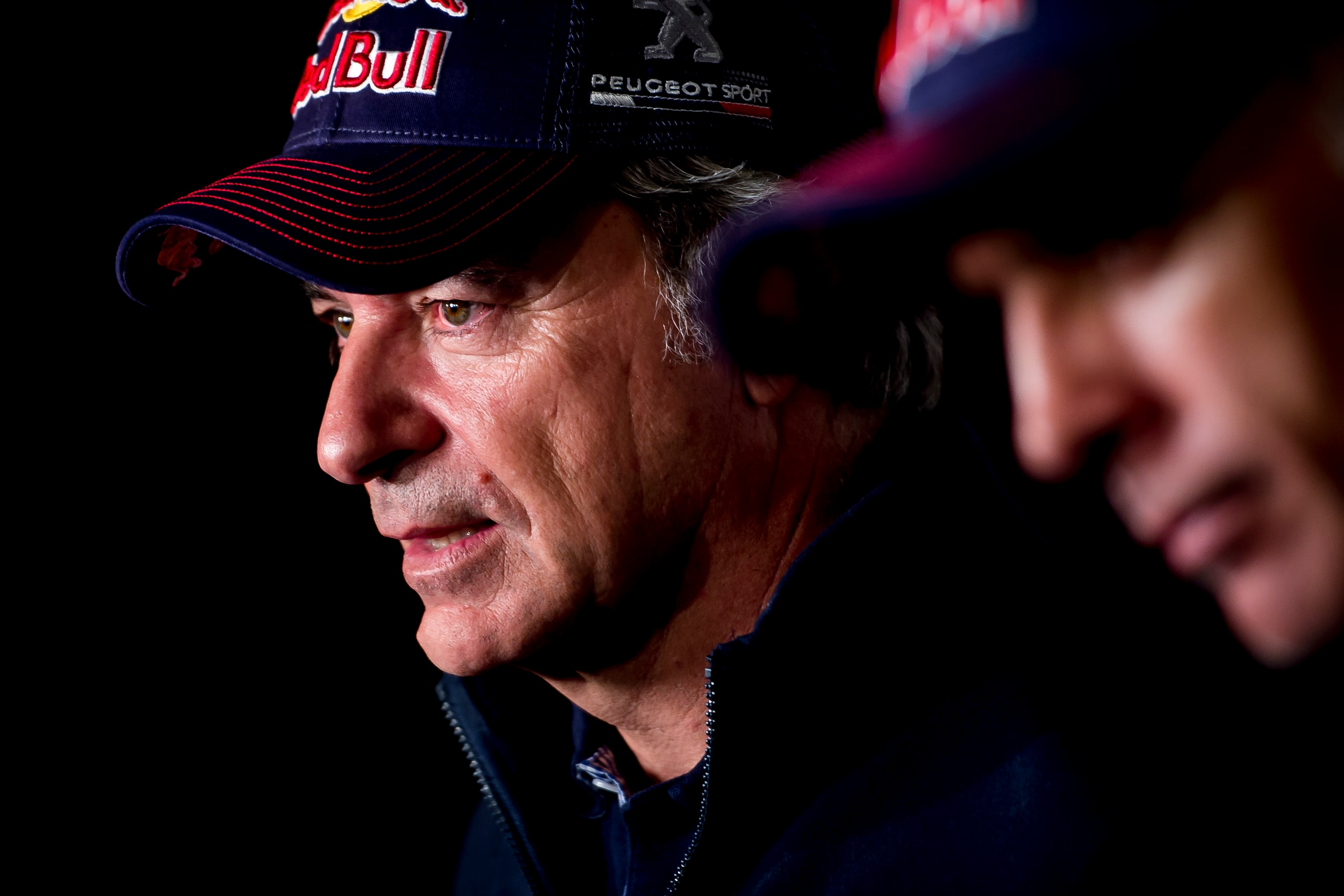 MADRID, SPAIN - JANUARY 22: The pilot Carlos Sainz and co-driver Lucas Cruz, winners of 2018 Dakar Rally, attend a press conference at Hotel Hilton Madrid Airport on January 22, 2018 in Madrid, Spain. (Photo by Samuel de Roman/Getty Images)
