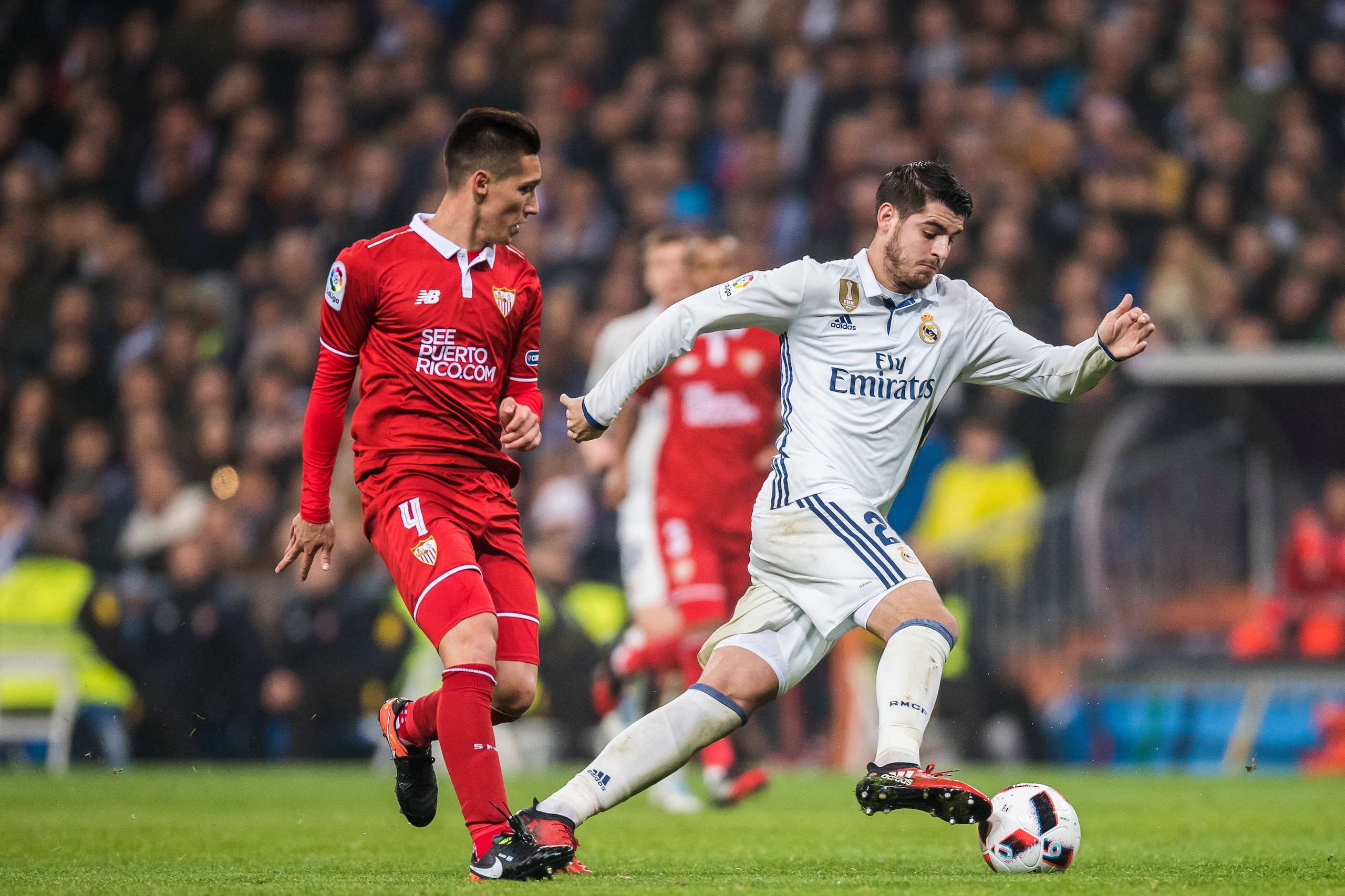 MADRID, SPAIN - JANUARY 04: Alvaro Morata (r) of Real Madrid battles for the ball with Matias Kranevitter of Sevilla FC during their Copa del Rey Round of 16 match between Real Madrid and Sevilla FC at the Santiago Bernabeu Stadium on 04 January 2017 in M MADRID, SPAIN - JANUARY 04: Alvaro Morata (r) of Real Madrid battles for the ball with Matias Kranevitter of Sevilla FC during their Copa del Rey Round of 16 match between Real Madrid and Sevilla FC at the Santiago Bernabeu Stadium on 04 January 2017 in M