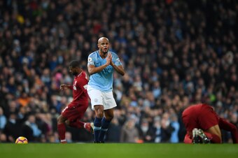 MANCHESTER, ENGLAND - JANUARY 03: Vincent Kompany of Manchester City reacts during the Premier League match between Manchester City and Liverpool FC at the Etihad Stadium on January 3, 2019 in Manchester, United Kingdom.  (Photo by Shaun Botterill/Getty I