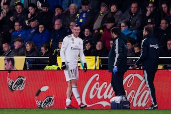 VILLAREAL, SPAIN - JANUARY 03: Gareth Bale of Real Madrid CF reacts as he need medical assistance during the La Liga match between Villarreal CF and Real Madrid CF at Estadio de la Ceramica on January 03, 2019 in Villarreal, Spain. (Photo by Alex Caparros
