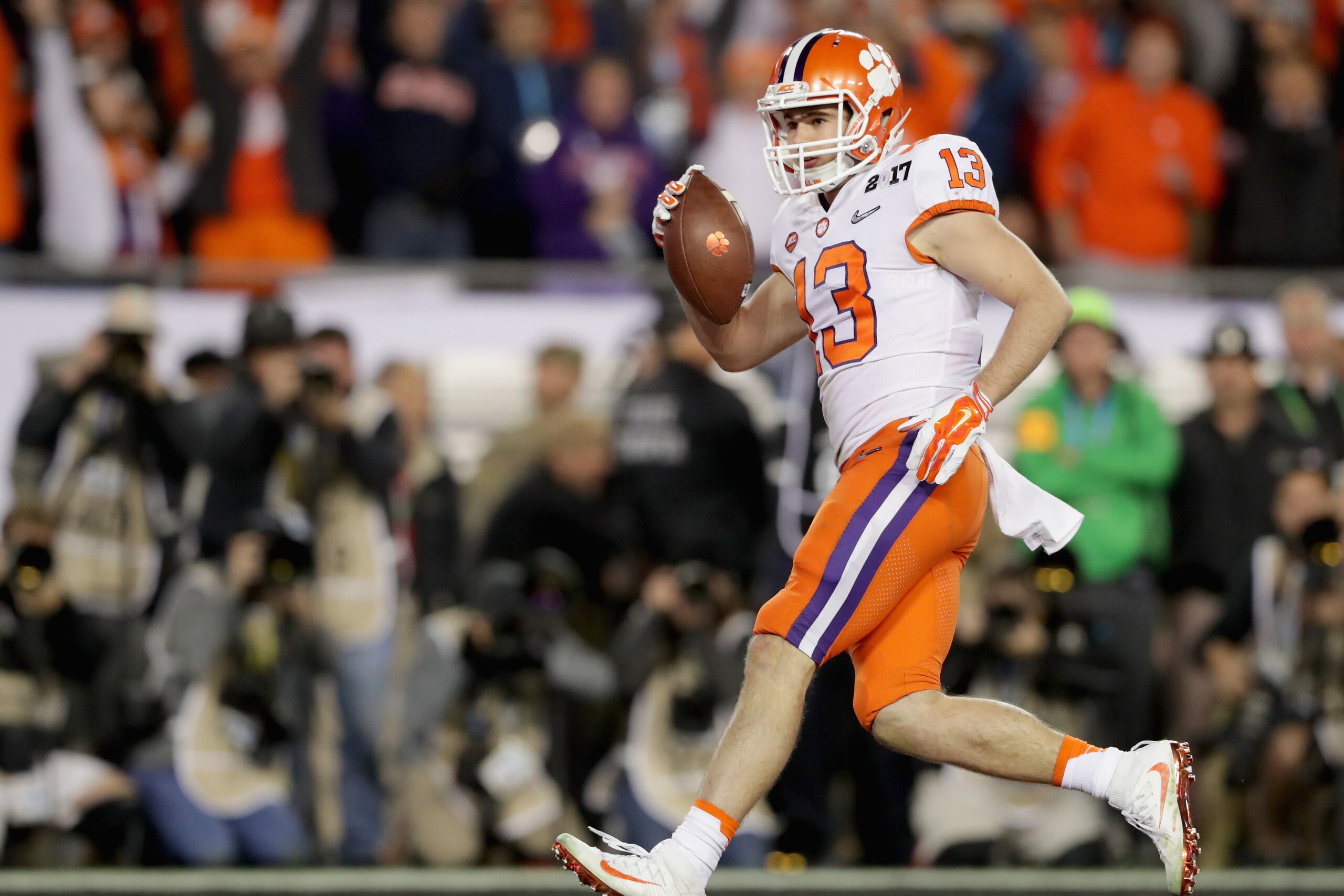 TAMPA, FL - JANUARY 09: Hunter Renfrow #13 of the Clemson Tigers scores a touchdown against the Alabama Crimson Tide during the 2017 College Football Playoff National Championship Game at Raymond James Stadium on January 9, 2017 in Tampa, Florida. (Phot TAMPA, FL - JANUARY 09: Hunter Renfrow #13 of the Clemson Tigers scores a touchdown against the Alabama Crimson Tide during the 2017 College Football Playoff National Championship Game at Raymond James Stadium on January 9, 2017 in Tampa, Florida. (Phot