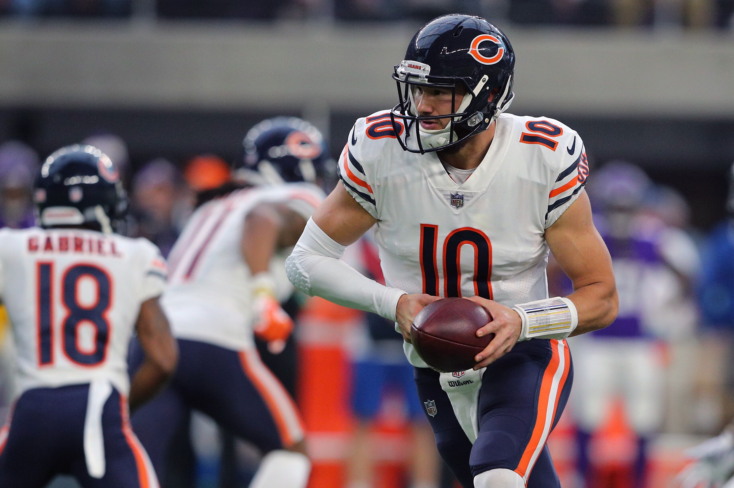 MINNEAPOLIS, MN - DECEMBER 30: Mitchell Trubisky #10 of the Chicago Bears looks for the hand off in the first quarter against the Minnesota Vikings at U.S. Bank Stadium on December 30, 2018 in Minneapolis, Minnesota. (Photo by Adam Bettcher/Getty Images)