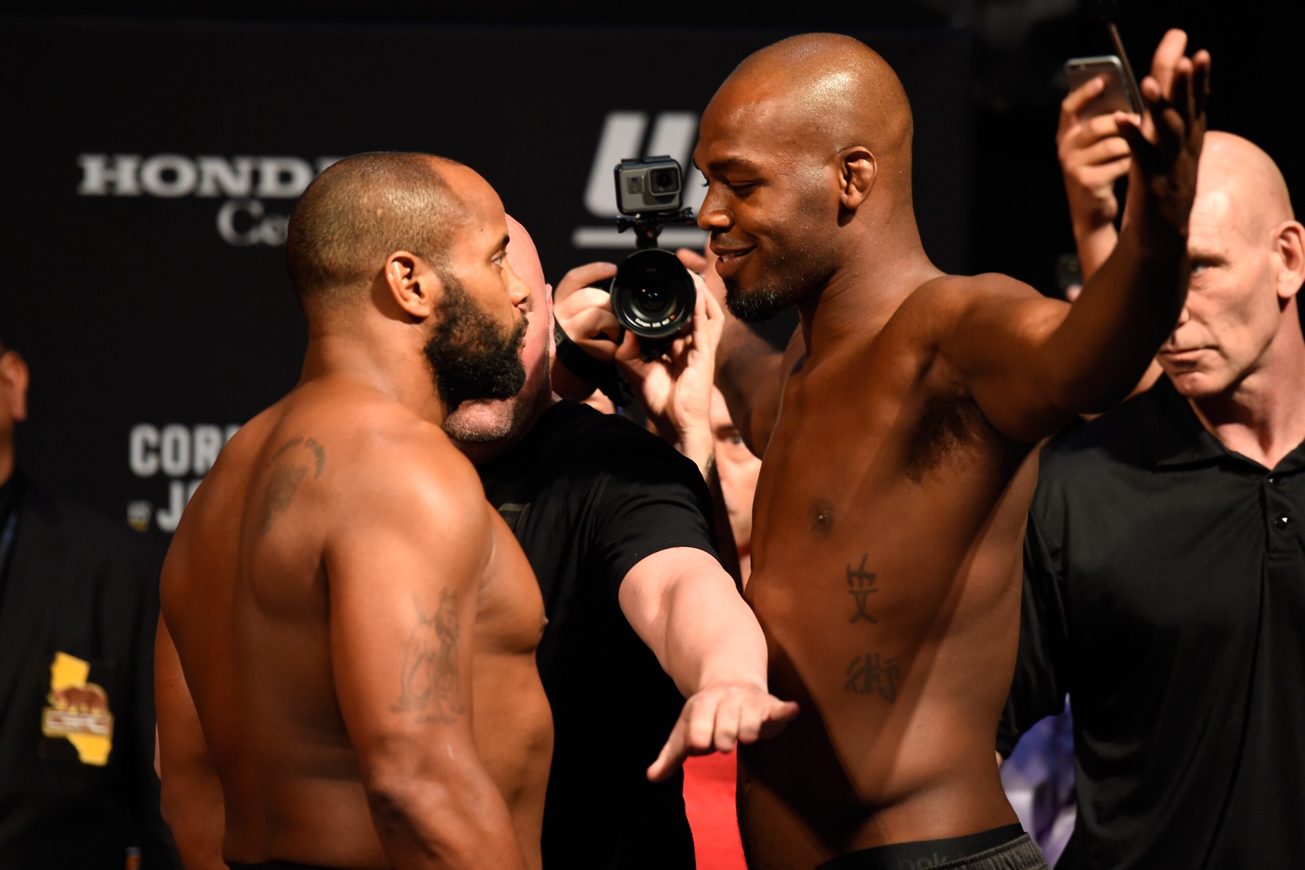 ANAHEIM, CA - JULY 28:   (L-R) Daniel Cormier and Jon Jones face off during the UFC 214 weigh-in inside the Honda Center on July 28, 2017 in Anaheim, California. (Photo by Josh Hedges/Zuffa LLC/Zuffa LLC via Getty Images)
