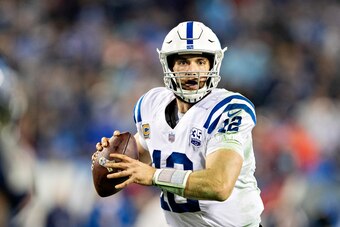 NASHVILLE, TN - DECEMBER 30:  Andrew Luck #12 of the Indianapolis Colts rolls out to pass during a game against the Tennessee Titans at Nissan Stadium on December 30, 2018 in Nashville, Tennessee.  The Colts defeated the Titans 33-17.   (Photo by Wesley H