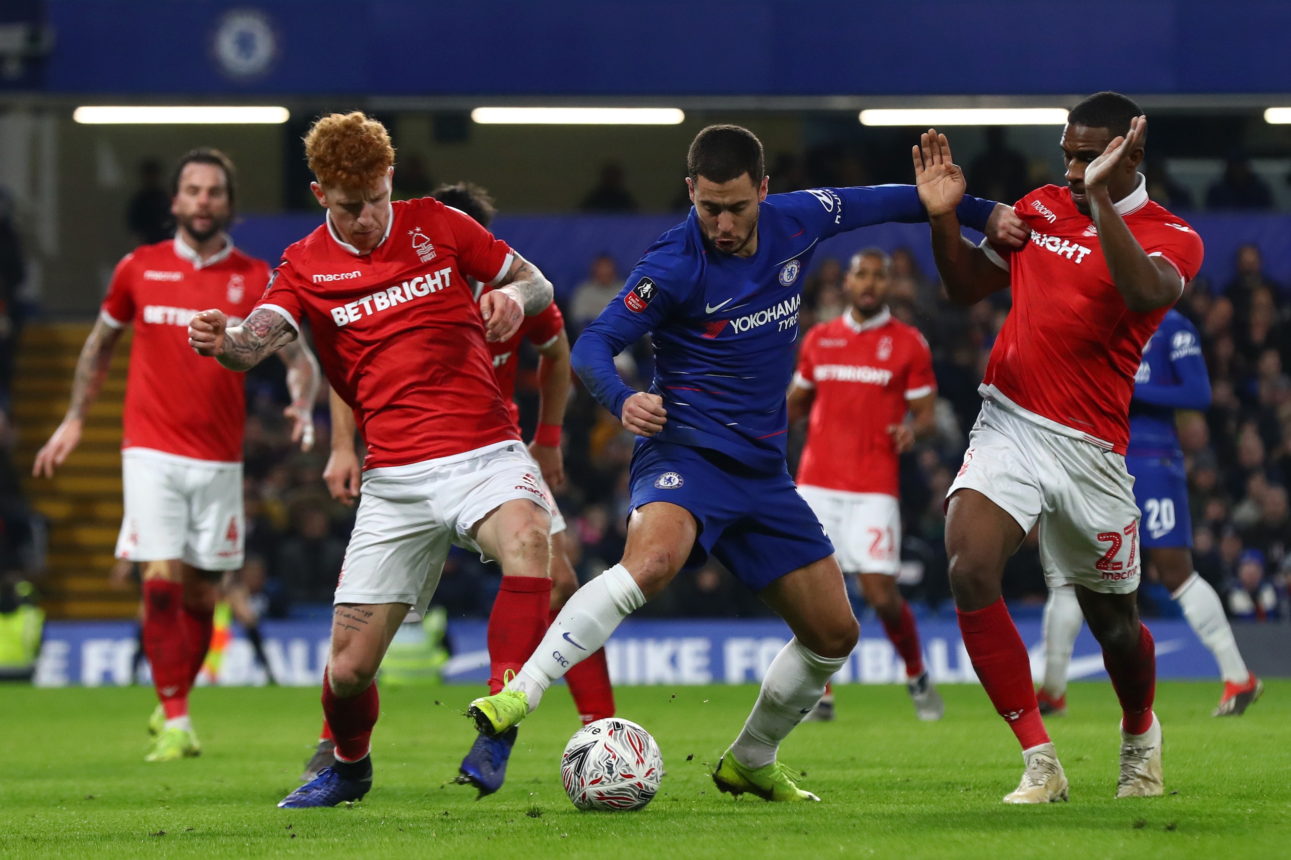 LONDON, ENGLAND - JANUARY 05:  Eden Hazard of Chelsea is challenged by Tendayi Darikwa of Nottingham Forest and Jack Colback of Nottingham Forest during the FA Cup Third Round match between Chelsea and Nottingham Forest at Stamford Bridge on January 5, 20