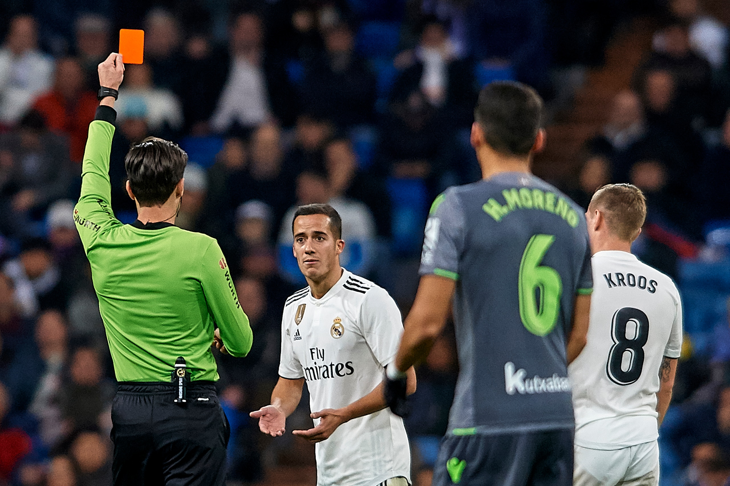 MADRID, SPAIN - JANUARY 06: Lucas Vazquez of Real Madrid is shown a red card by referee Munuera Montero during the La Liga match between Real Madrid CF and Real Sociedad at Estadio Santiago Bernabeu on January 06, 2019 in Madrid, Spain. (Photo by Quality 