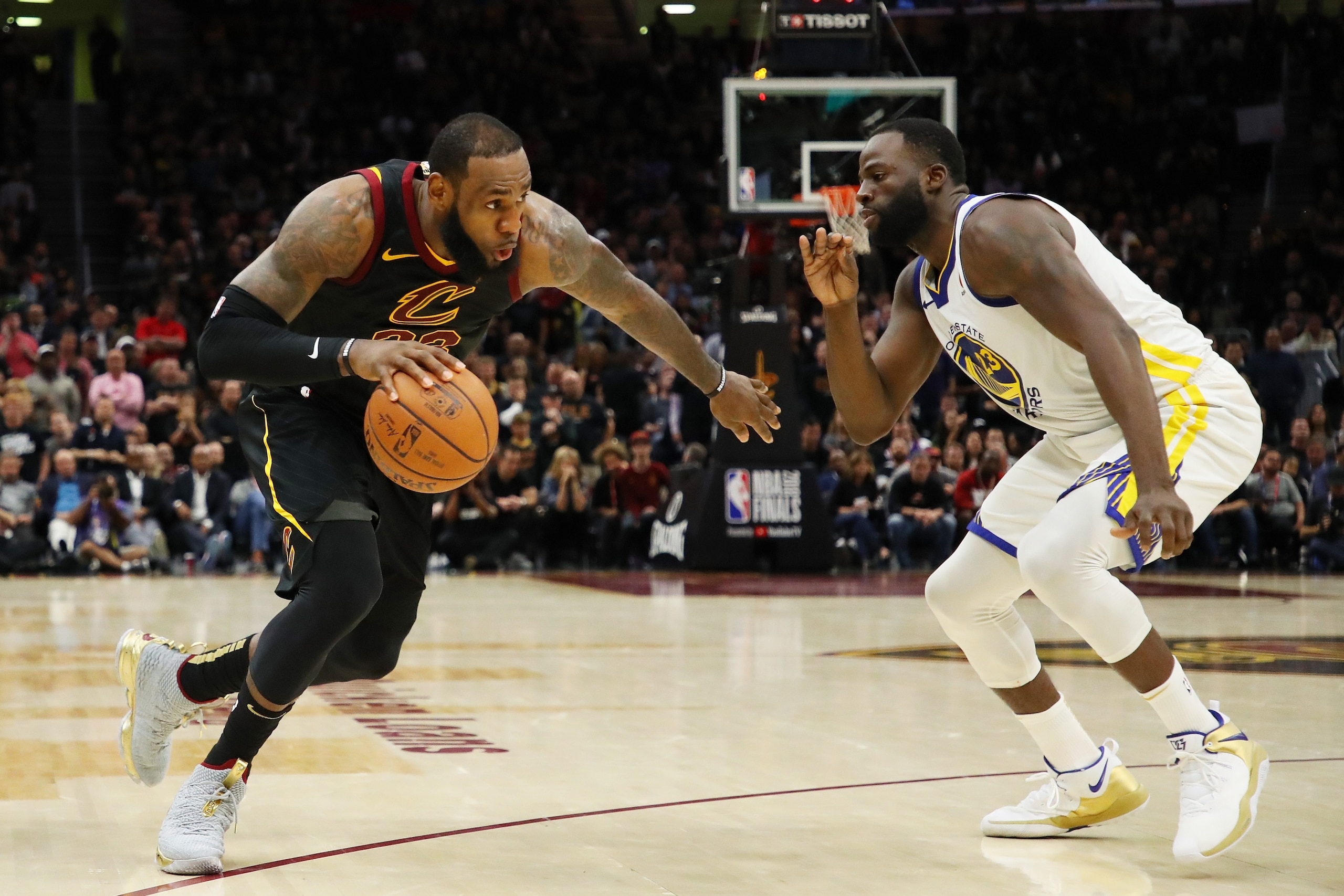 CLEVELAND, OH - JUNE 06: LeBron James #23 of the Cleveland Cavaliers drives against Draymond Green #23 of the Golden State Warriors during Game Three of the 2018 NBA Finals at Quicken Loans Arena on June 6, 2018 in Cleveland, Ohio. NOTE TO USER: User exp CLEVELAND, OH - JUNE 06: LeBron James #23 of the Cleveland Cavaliers drives against Draymond Green #23 of the Golden State Warriors during Game Three of the 2018 NBA Finals at Quicken Loans Arena on June 6, 2018 in Cleveland, Ohio. NOTE TO USER: User exp