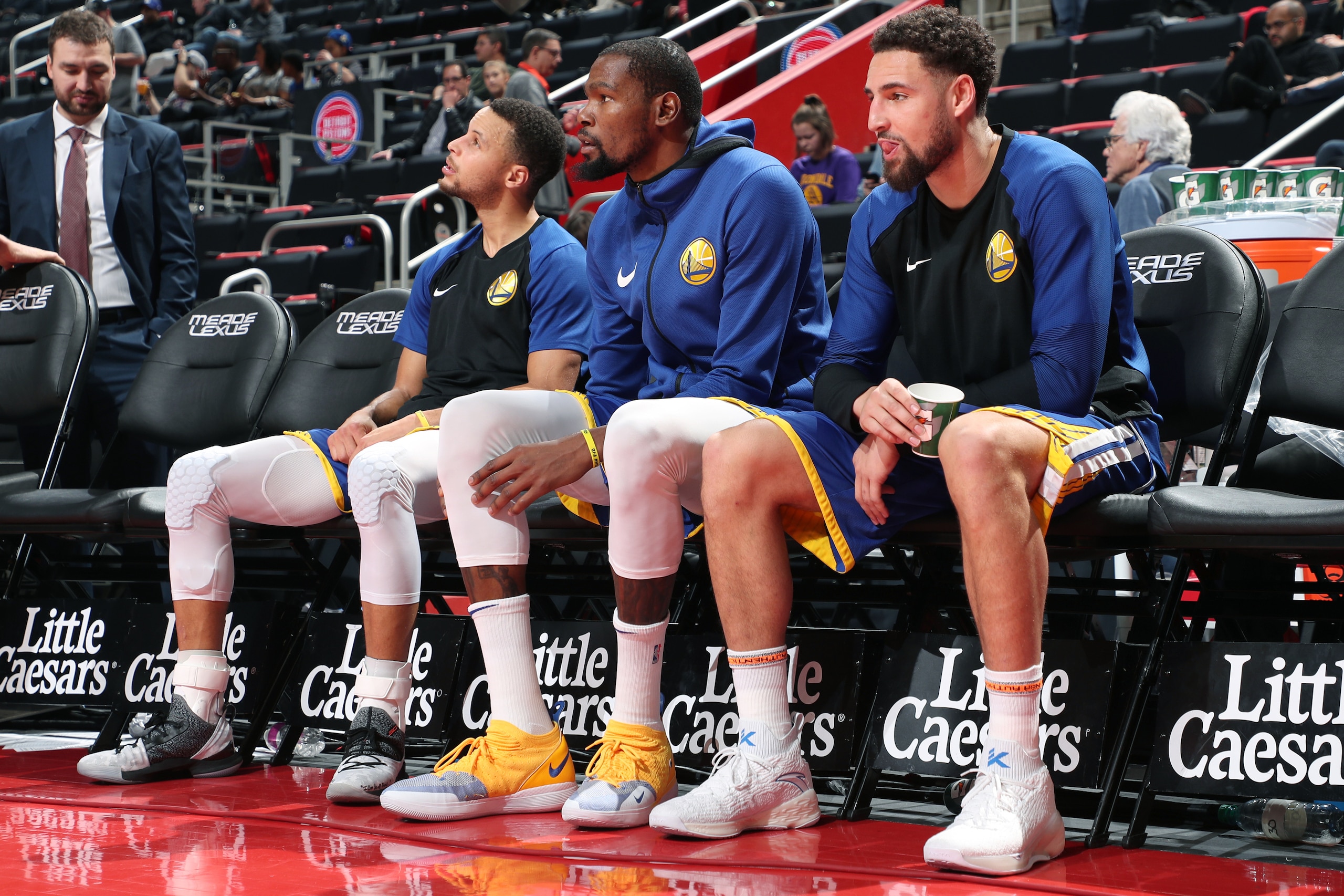 DETROIT, MI - DECEMBER 1: Stephen Curry #30, Kevin Durant #35, and Klay Thompson #11 of the Golden State Warriors look on before the game against the Detroit Pistons on December 1, 2018 at Little Caesars Arena in Detroit, Michigan. NOTE TO USER: User expr DETROIT, MI - DECEMBER 1: Stephen Curry #30, Kevin Durant #35, and Klay Thompson #11 of the Golden State Warriors look on before the game against the Detroit Pistons on December 1, 2018 at Little Caesars Arena in Detroit, Michigan. NOTE TO USER: User expr