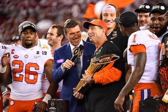 SANTA CLARA, CA - JANUARY 07: Head Coach Dabo Swinney of the Clemson Tigers receives the trophy after defeating the Alabama Crimson Tide during the College Football Playoff National Championship held at Levi's Stadium on January 7, 2019 in Santa Clara, Ca