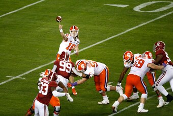 SANTA CLARA, CALIFORNIA - JANUARY 07: Trevor Lawrence #16 of the Clemson Tigers throws a pass against the Alabama Crimson Tide during the second quarter in the College Football Playoff National Championship at Levi's Stadium on January 07, 2019 in Santa C