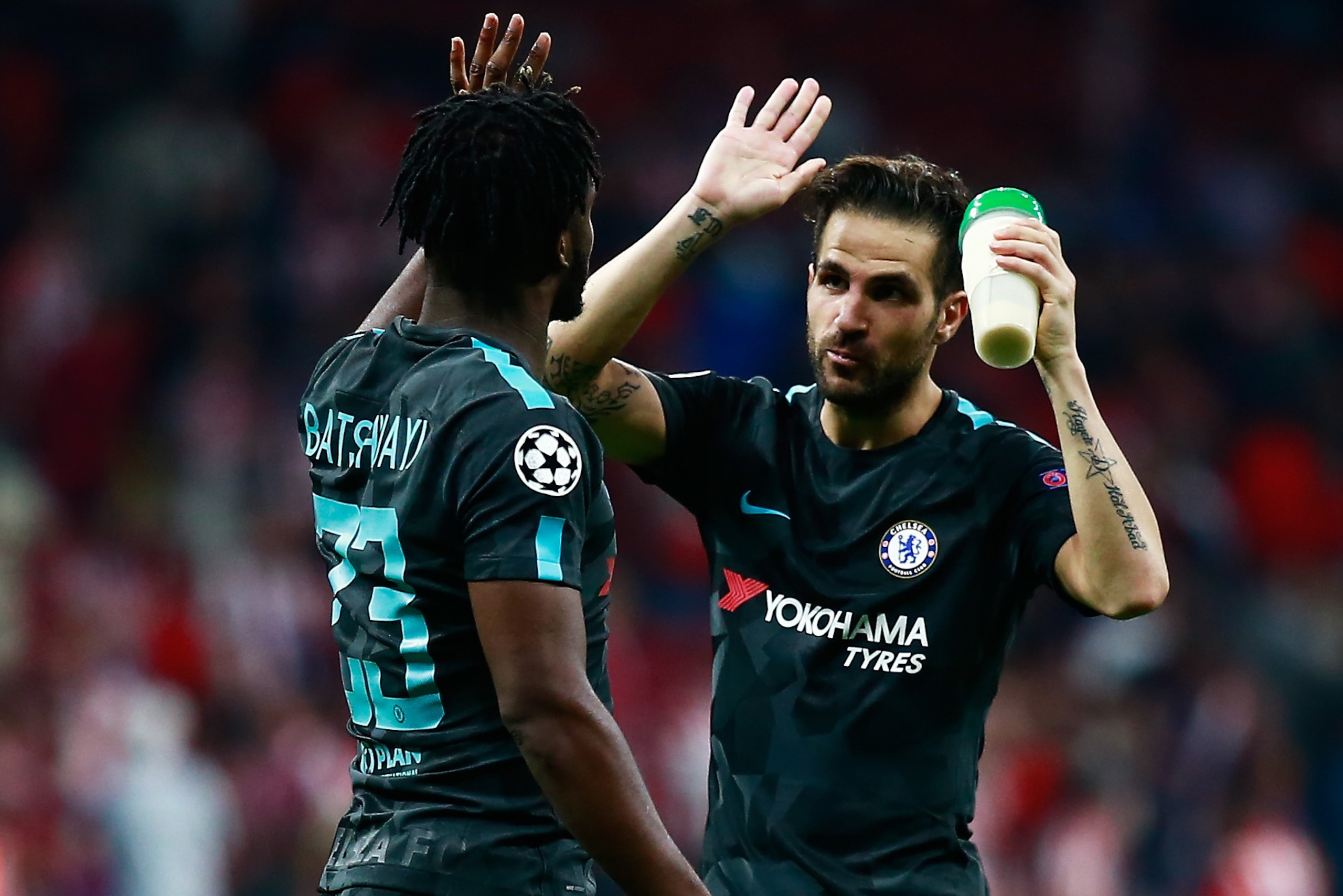 MADRID, SPAIN - SEPTEMBER 27:  Michy Batshuayi of Chelsea and Cesc Fabregas of Chelsea celebrate victory uring the UEFA Champions League group C match between Atletico Madrid and Chelsea FC at Estadio Wanda Metropolitano on September 27, 2017 in Madrid, S