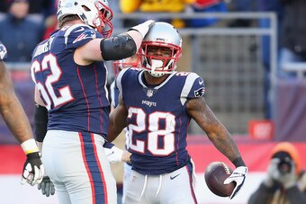FOXBOROUGH, MA - DECEMBER 23:  James White #28 of the New England Patriots celebrates with Joe Thuney #62 after rushing for a 27-yard touchdown during the second quarter against the Buffalo Bills at Gillette Stadium on December 23, 2018 in Foxborough, Mas