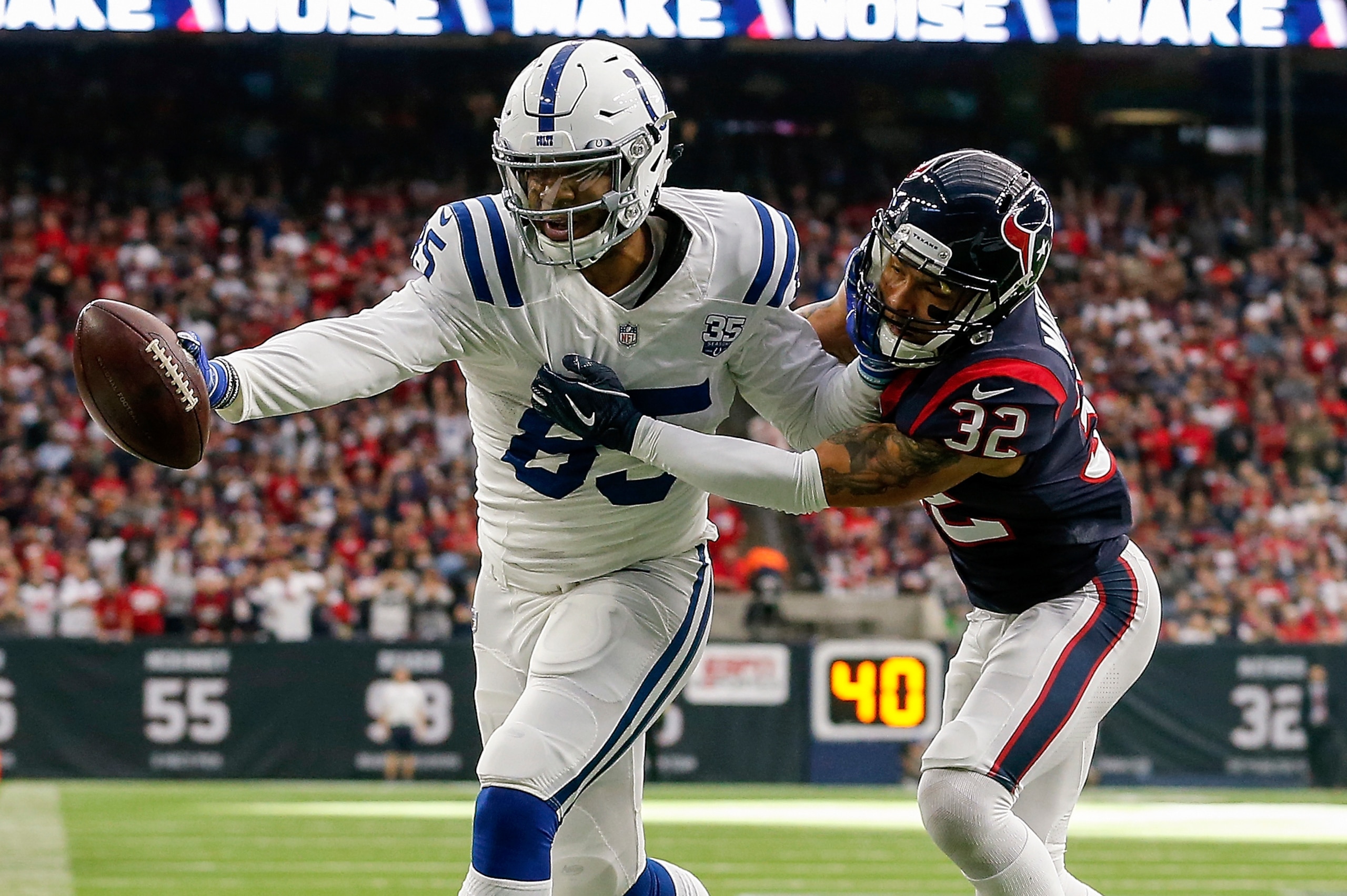 HOUSTON, TX - JANUARY 05: Eric Ebron #85 of the Indianapolis Colts reaches for the end zone for a touchdown defended by Tyrann Mathieu #32 of the Houston Texans in the first quarter during the Wild Card Round at NRG Stadium on January 5, 2019 in Houston, HOUSTON, TX - JANUARY 05: Eric Ebron #85 of the Indianapolis Colts reaches for the end zone for a touchdown defended by Tyrann Mathieu #32 of the Houston Texans in the first quarter during the Wild Card Round at NRG Stadium on January 5, 2019 in Houston,