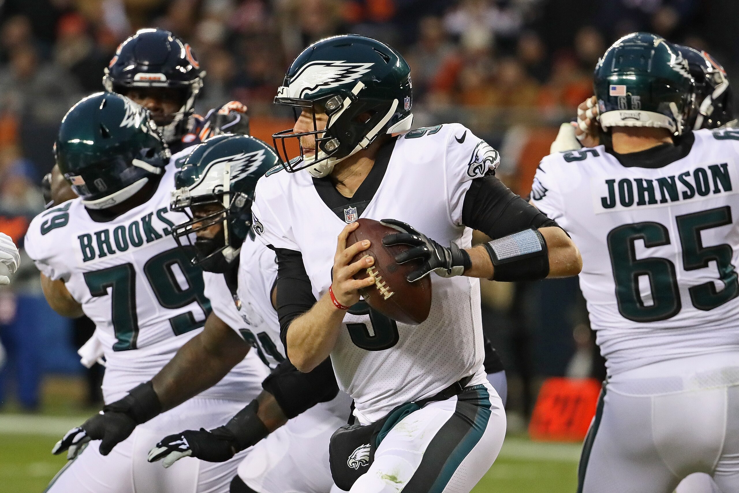 CHICAGO, IL - JANUARY 06: Nick Foles #9 of the Philadelphia Eagles rolls out to look for a receiver against the Chicago Bears during an NFC Wild Card playoff game at Soldier Field on January 6, 2019 in Chicago, Illinois. The Eagles defeated the Bears 16- CHICAGO, IL - JANUARY 06: Nick Foles #9 of the Philadelphia Eagles rolls out to look for a receiver against the Chicago Bears during an NFC Wild Card playoff game at Soldier Field on January 6, 2019 in Chicago, Illinois. The Eagles defeated the Bears 16-