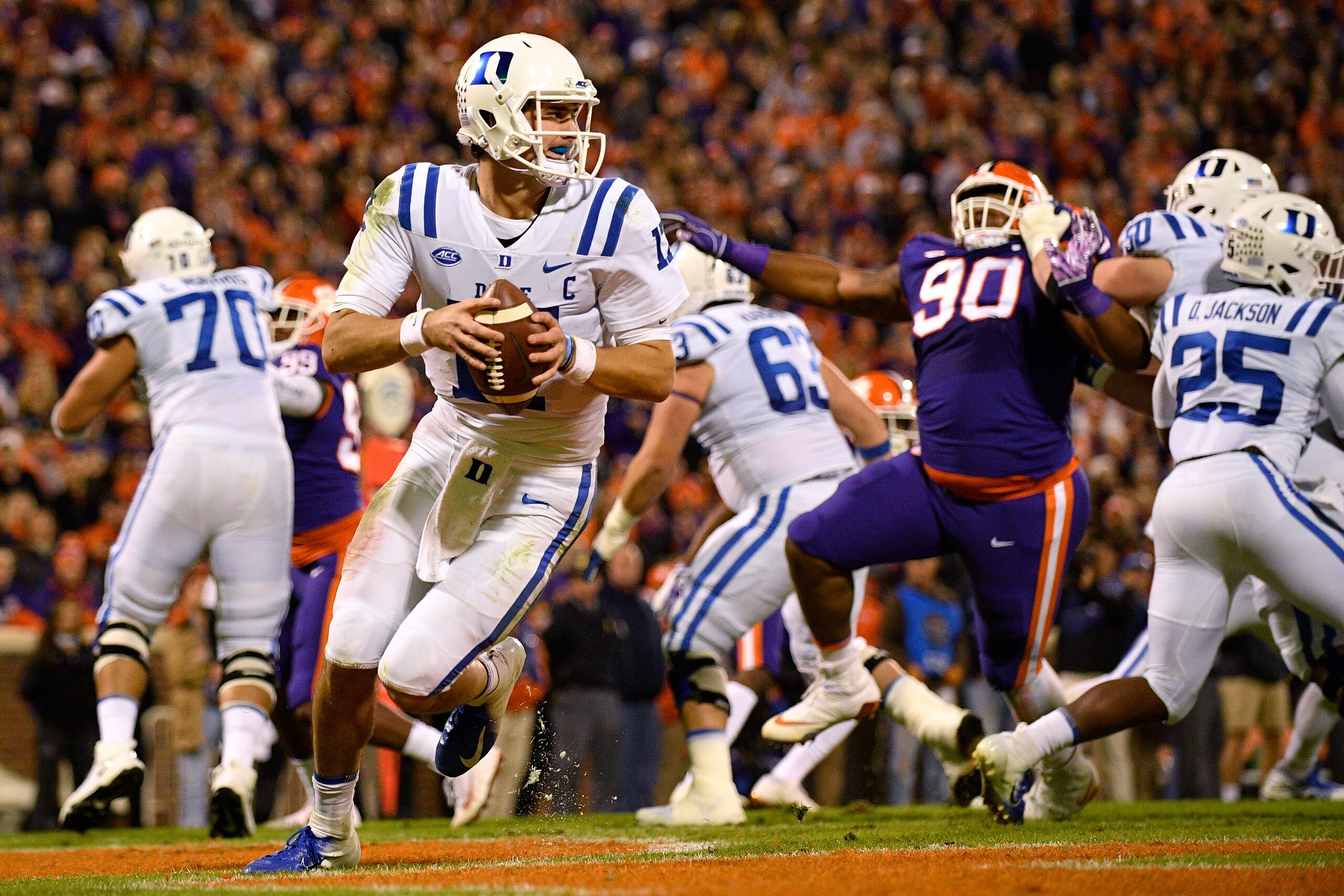 CLEMSON, SC - NOVEMBER 17: Daniel Jones #17 of the Duke Blue Devils scrambles out of the pocket against the Clemson Tigers at Clemson Memorial Stadium on November 17, 2018 in Clemson, South Carolina. (Photo by Lance King/Getty Images)