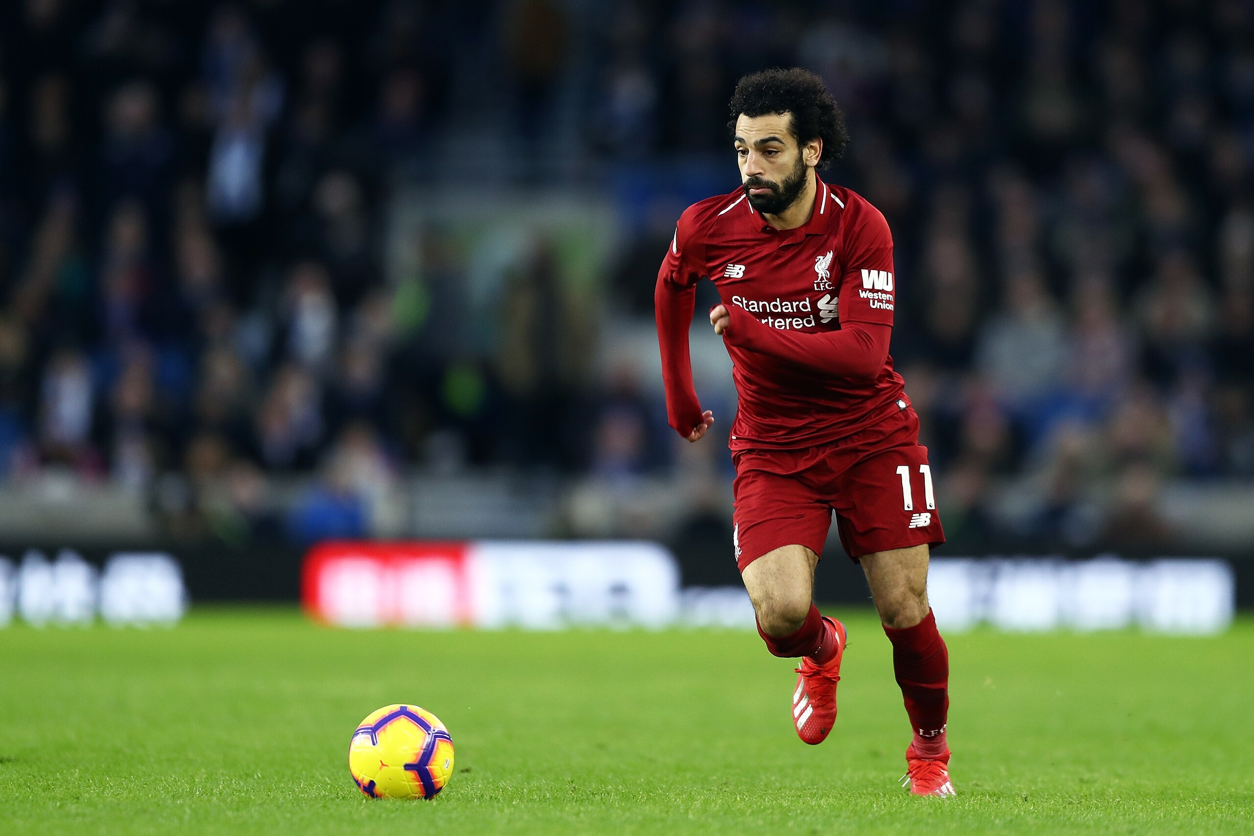 BRIGHTON, ENGLAND - JANUARY 12:  Mohamed Salah of Liverpool in action during the Premier League match between Brighton & Hove Albion and Liverpool FC at American Express Community Stadium on January 12, 2019 in Brighton, United Kingdom.  (Photo by Bryn Le