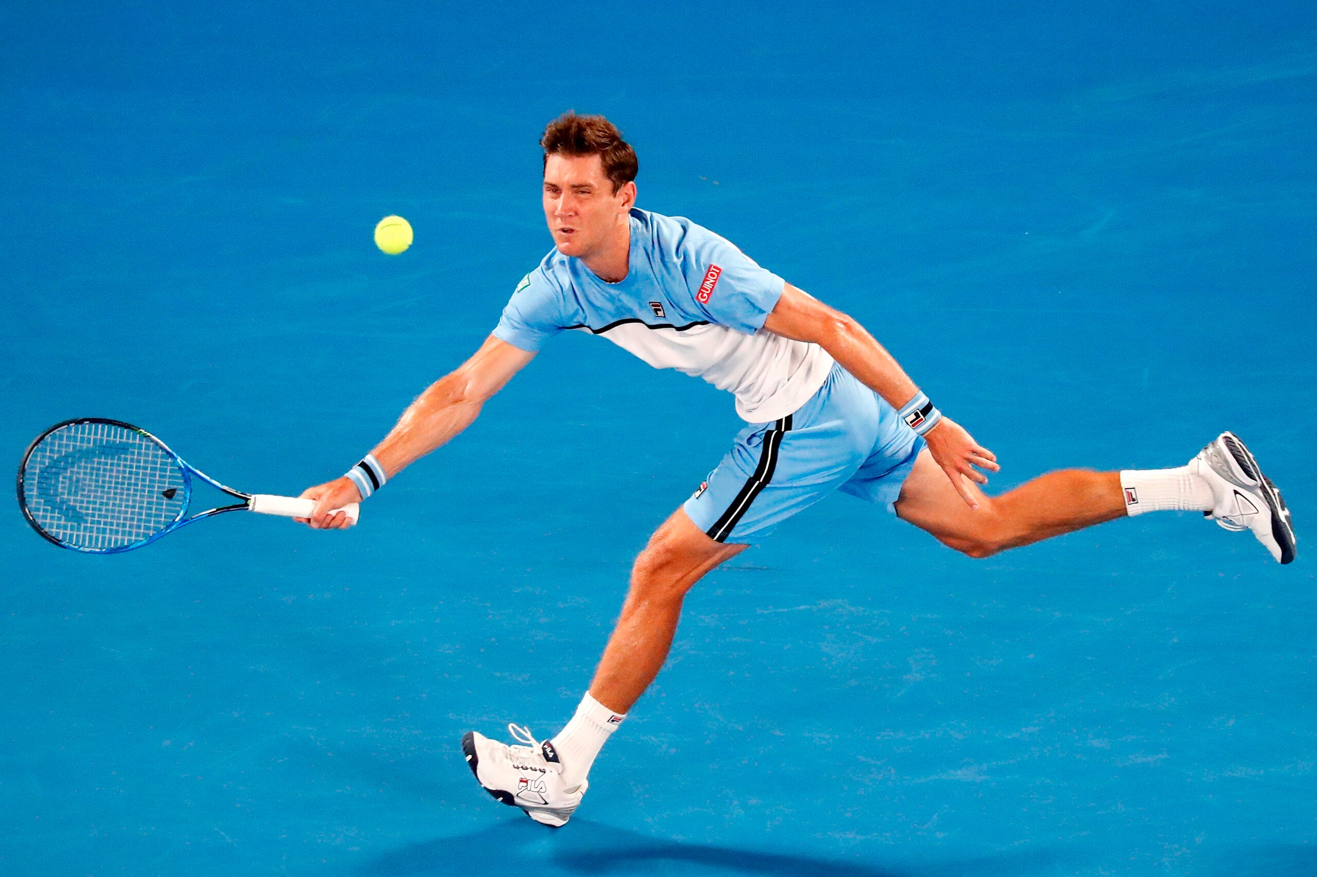 Australia's Matthew Ebden hits a return against Spain's Rafael Nadal during their men's singles match on day three of the Australian Open tennis tournament in Melbourne on January 16, 2019. (Photo by DAVID GRAY / AFP) / -- IMAGE RESTRICTED TO EDITORIAL US