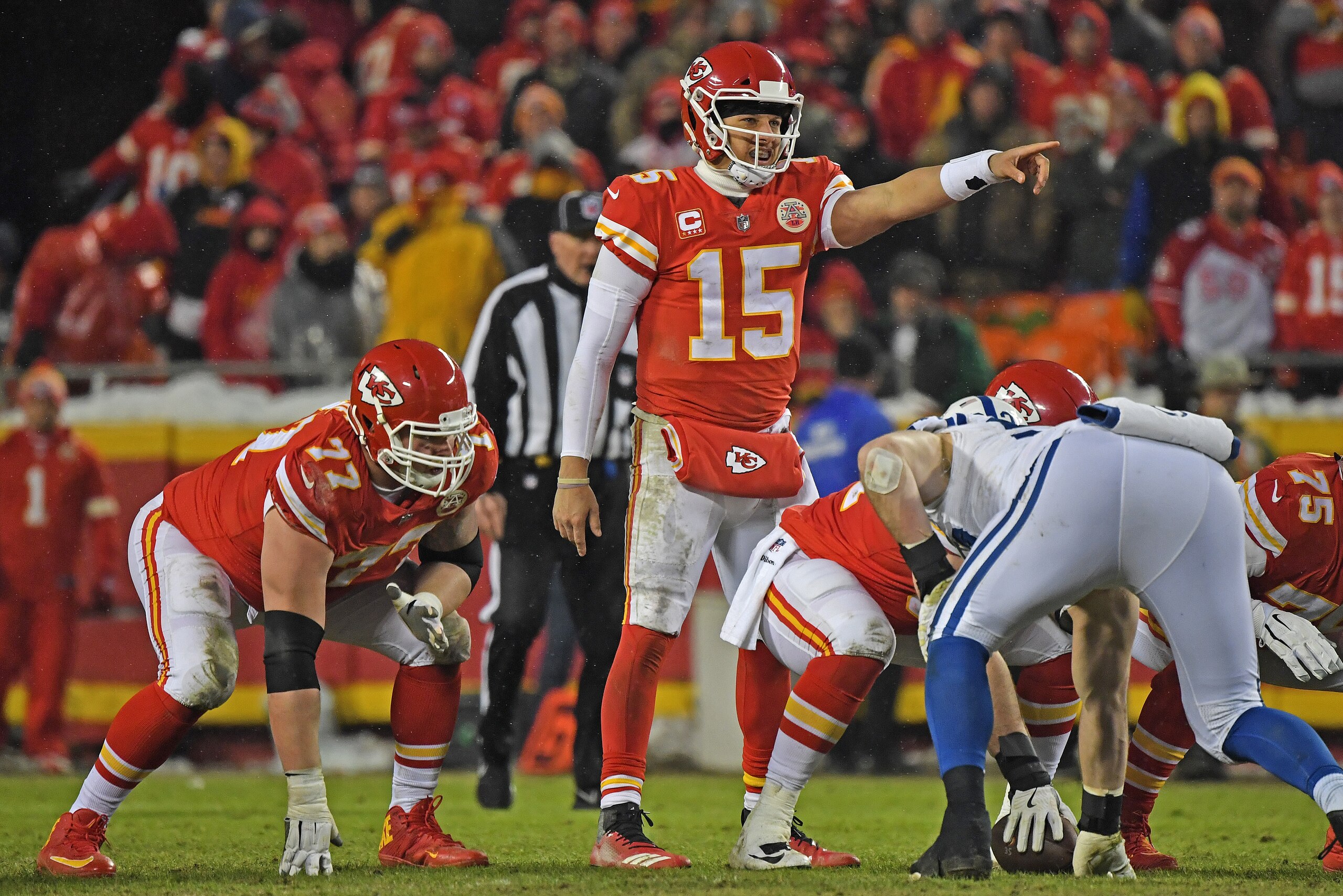 KANSAS CITY, MO - JANUARY 12: Quarterback Patrick Mahomes #15 of the Kansas City Chiefs calls out a play at the line against the Indianapolis Colts during the second half of the AFC Divisional Round playoff game at Arrowhead Stadium on January 12, 2019 in