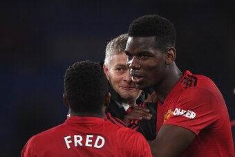 CARDIFF, WALES - DECEMBER 22:  Ole Gunnar Solskjaer, Interim Manager of Manchester United celebrates with Fred and Paul Pogba after the Premier League match between Cardiff City and Manchester United at Cardiff City Stadium on December 22, 2018 in Cardiff
