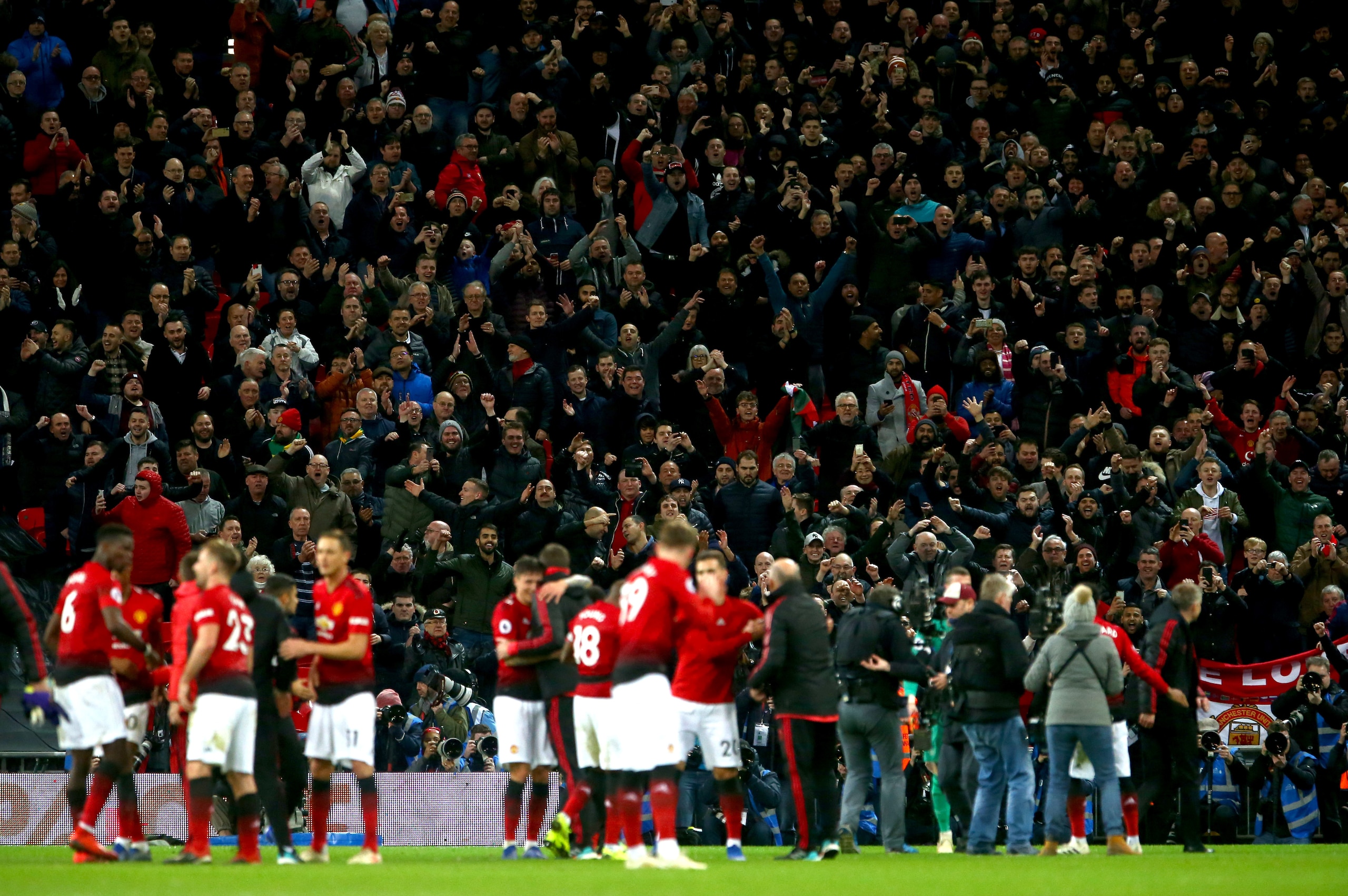 LONDON, ENGLAND - JANUARY 13: Manchester United fans celebrate after their team win the Premier League match between Manchester United and Tottenham Hotspur at Wembley Stadium on January 13, 2019 in London, United Kingdom. (Photo by Chloe Knott - Danehous
