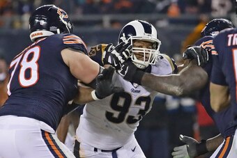 CHICAGO, IL - DECEMBER 09:  Ndamukong Suh #93 of the Los Angeles Rams rushes against Bryan Witzmann #78 and James Daniels #68 of the Chicago Bears at Soldier Field on December 9, 2018 in Chicago, Illinois. The Bears defeated the Rams 15-6.  (Photo by Jona