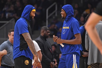 SAN JOSE, CA - OCTOBER 12: DeMarcus Cousins #0 and Kevin Durant #35 of the Golden State Warriors talk during a pre-season game against the Los Angeles Lakers on October 12, 2018 at the SAP Center in San Jose, California. NOTE TO USER: User expressly ackno