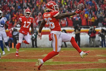 KANSAS CITY, MO - JANUARY 12: Running back Damien Williams #26 of the Kansas City Chiefs rushes into the end zone for a touchdown during the first half of the AFC Divisional Round playoff game against the Indianapolis Colts at Arrowhead Stadium on January