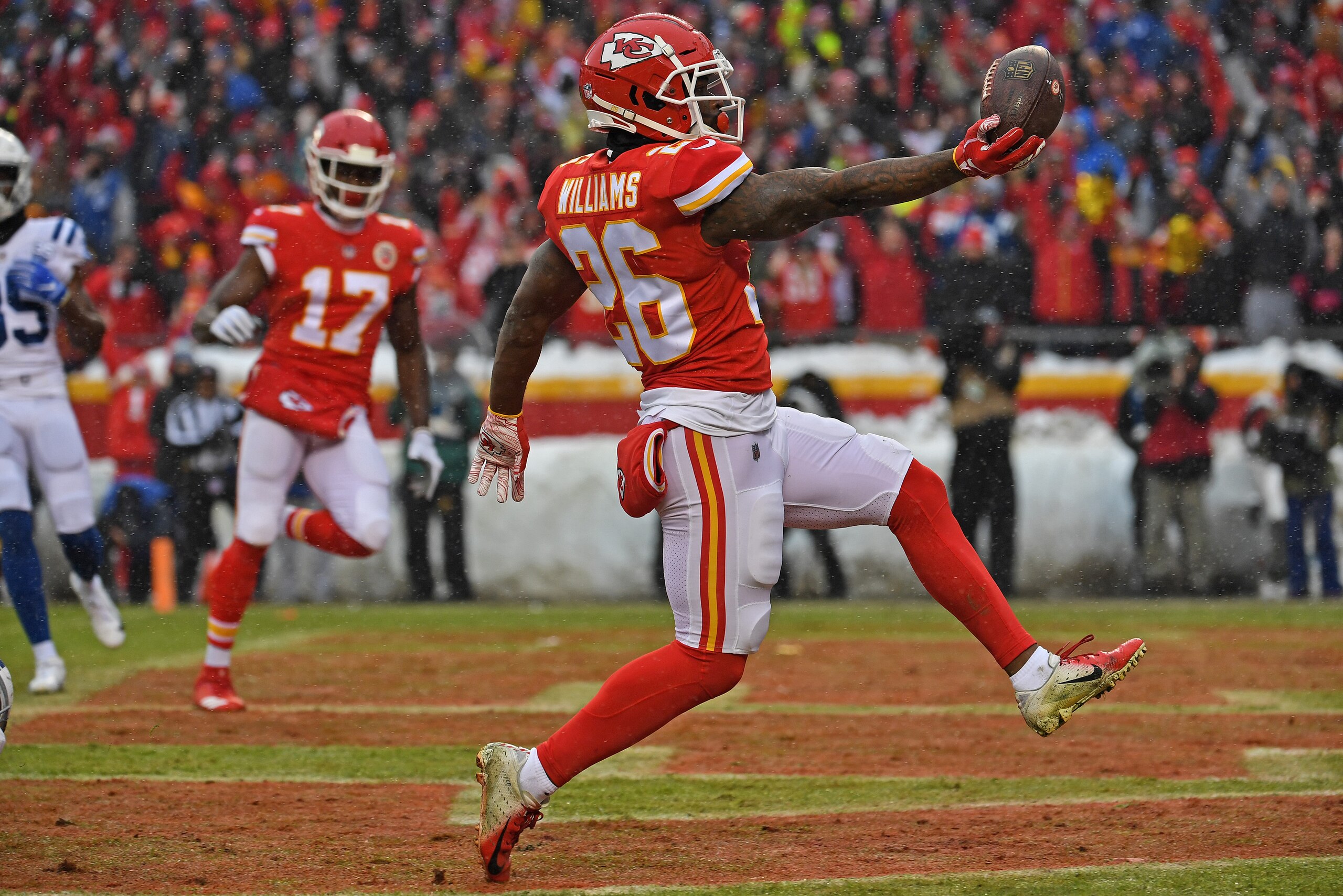 KANSAS CITY, MO - JANUARY 12: Running back Damien Williams #26 of the Kansas City Chiefs rushes into the end zone for a touchdown during the first half of the AFC Divisional Round playoff game against the Indianapolis Colts at Arrowhead Stadium on January KANSAS CITY, MO - JANUARY 12: Running back Damien Williams #26 of the Kansas City Chiefs rushes into the end zone for a touchdown during the first half of the AFC Divisional Round playoff game against the Indianapolis Colts at Arrowhead Stadium on January