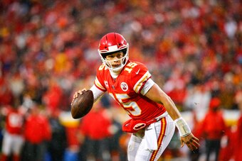 KANSAS CITY, MO - JANUARY 12: Quarterback Patrick Mahomes #15 of the Kansas City Chiefs rolls out on a pass play in the AFC Divisional Playoff against the Indianapolis Colts at Arrowhead Stadium on January 12, 2019 in Kansas City, Missouri. (Photo by Davi