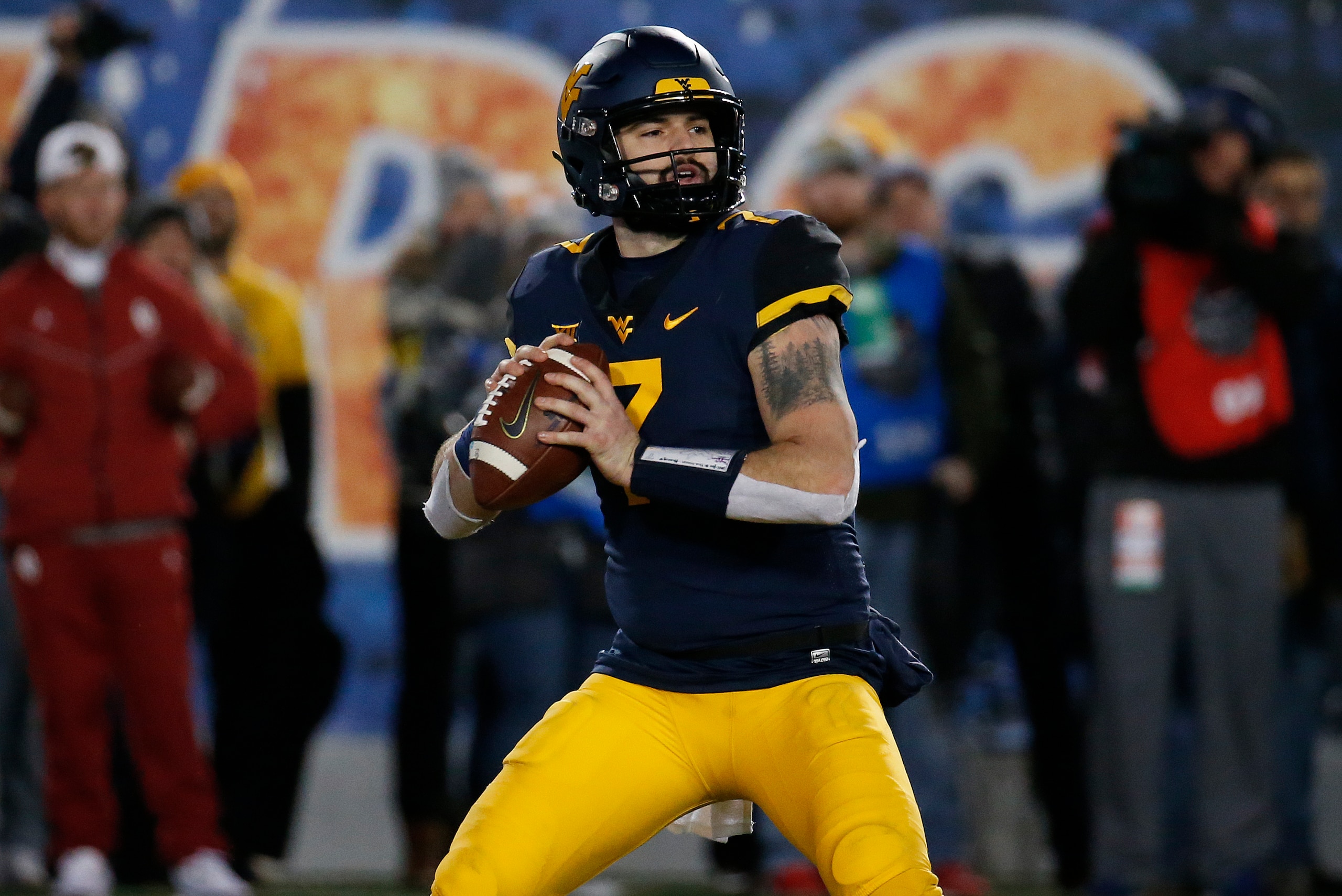 MORGANTOWN, WV - NOVEMBER 23:  Will Grier #7 of the West Virginia Mountaineers in action against the Oklahoma Soonersrs on November 23, 2018 at Mountaineer Field in Morgantown, West Virginia.  (Photo by Justin K. Aller/Getty Images)