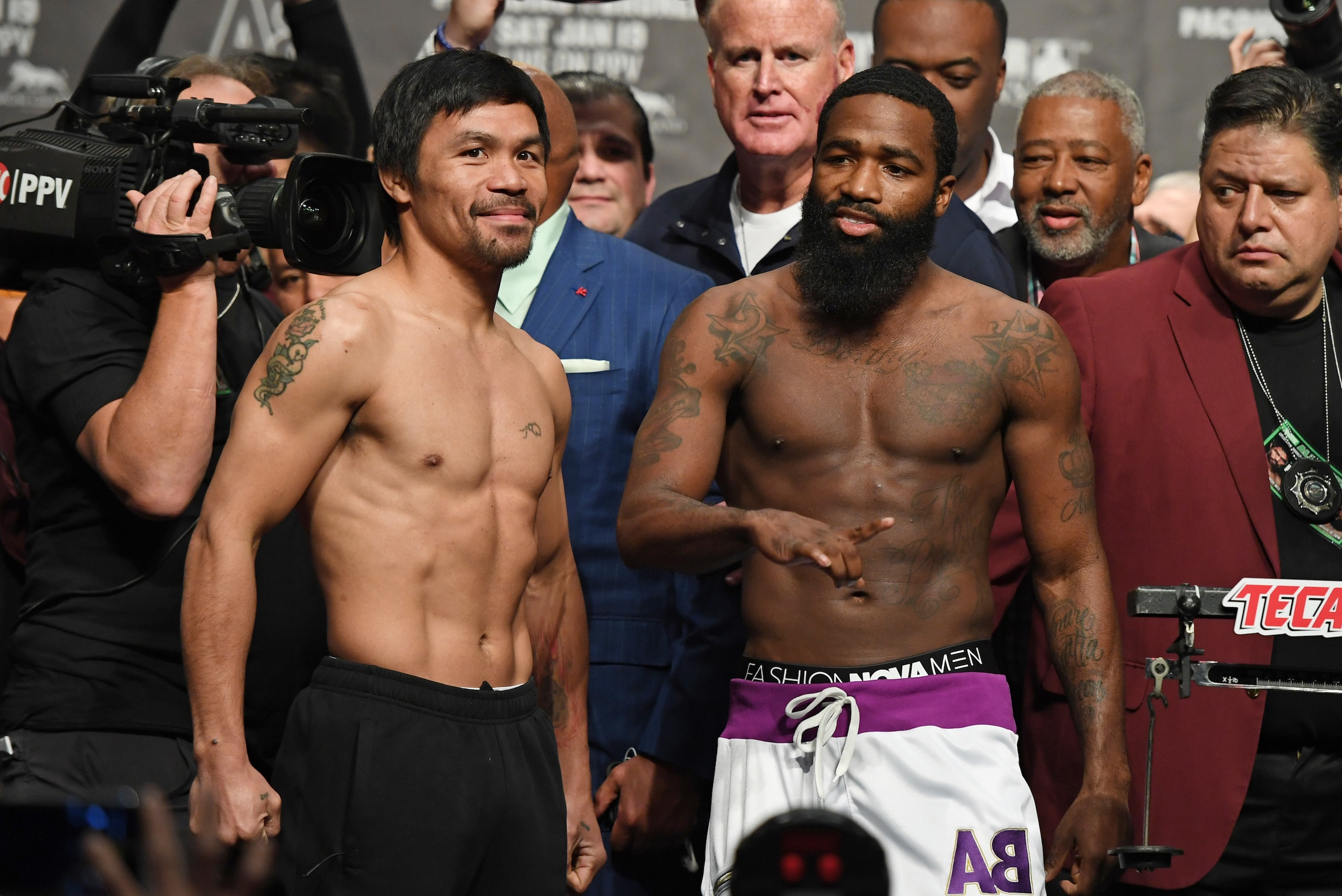 LAS VEGAS, NEVADA - JANUARY 18:  WBA welterweight champion Manny Pacquiao (L) and Adrien Broner pose during their official weigh-in at MGM Grand Garden Arena on January 18, 2019 in Las Vegas, Nevada. Pacquiao will defend his title against Broner on Januar