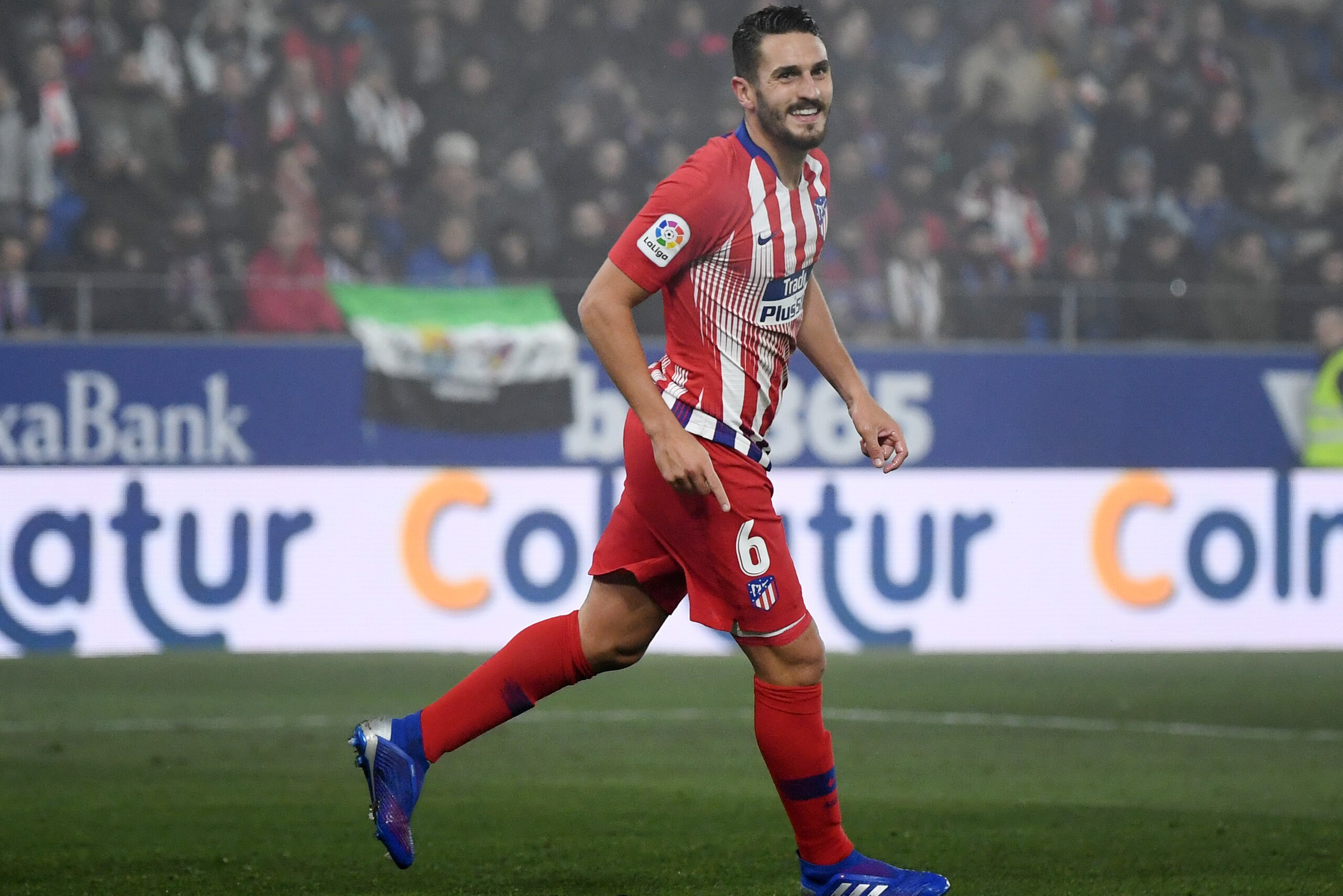 HUESCA, SPAIN - JANUARY 19:  Koke of Atletico Madrid celebrates after scoring his team's third goal during the La Liga match between SD Huesca and Club Atletico de Madrid at Estadio El Alcoraz on January 19, 2019 in Huesca, Spain.  (Photo by David Ramos/G