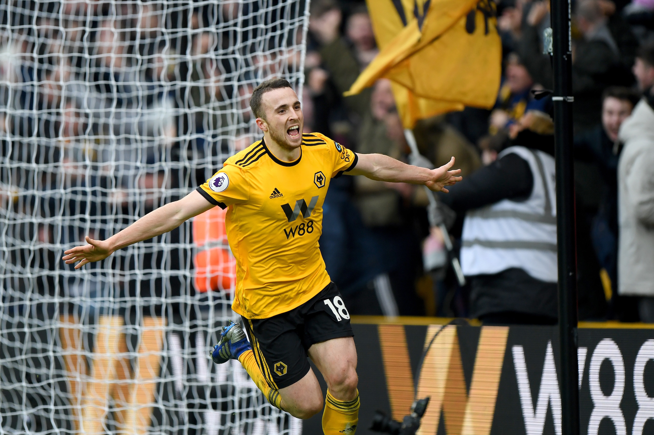 WOLVERHAMPTON, ENGLAND - JANUARY 19: Diogo Jota of Wolverhampton Wanderers celebrates after scoring a goal to make it 4-3 during the Premier League match between Wolverhampton Wanderers and Leicester City at Molineux on January 19, 2019 in Wolverhampton, 