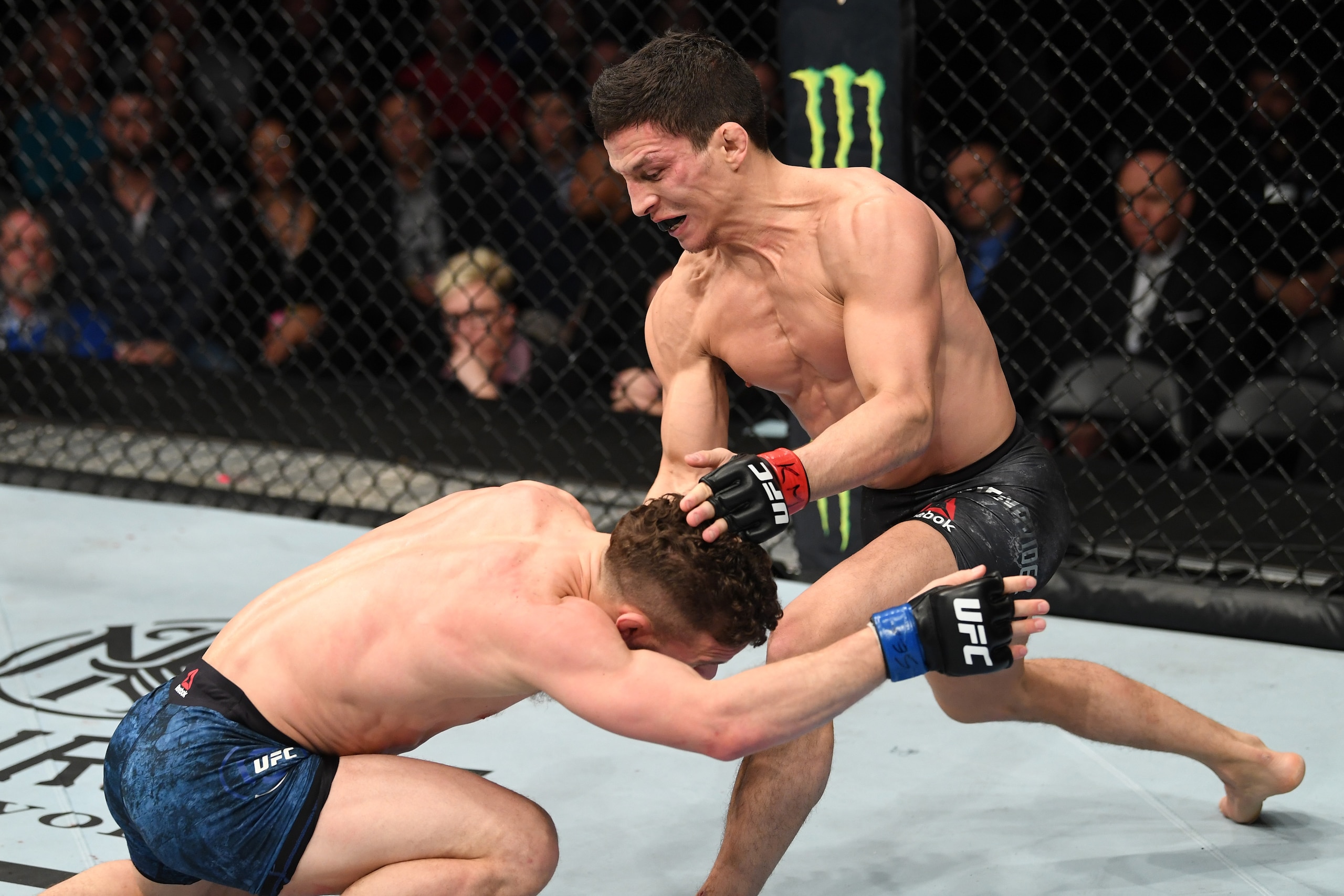 NEW YORK, NY - JANUARY 19:  (R-L) Joseph Benavidez defends a takedown attempt from Dustin Ortiz in their flyweight bout during the UFC Fight Night event at the Barclays Center on January 19, 2019 in the Brooklyn borough of New York City. (Photo by Josh He