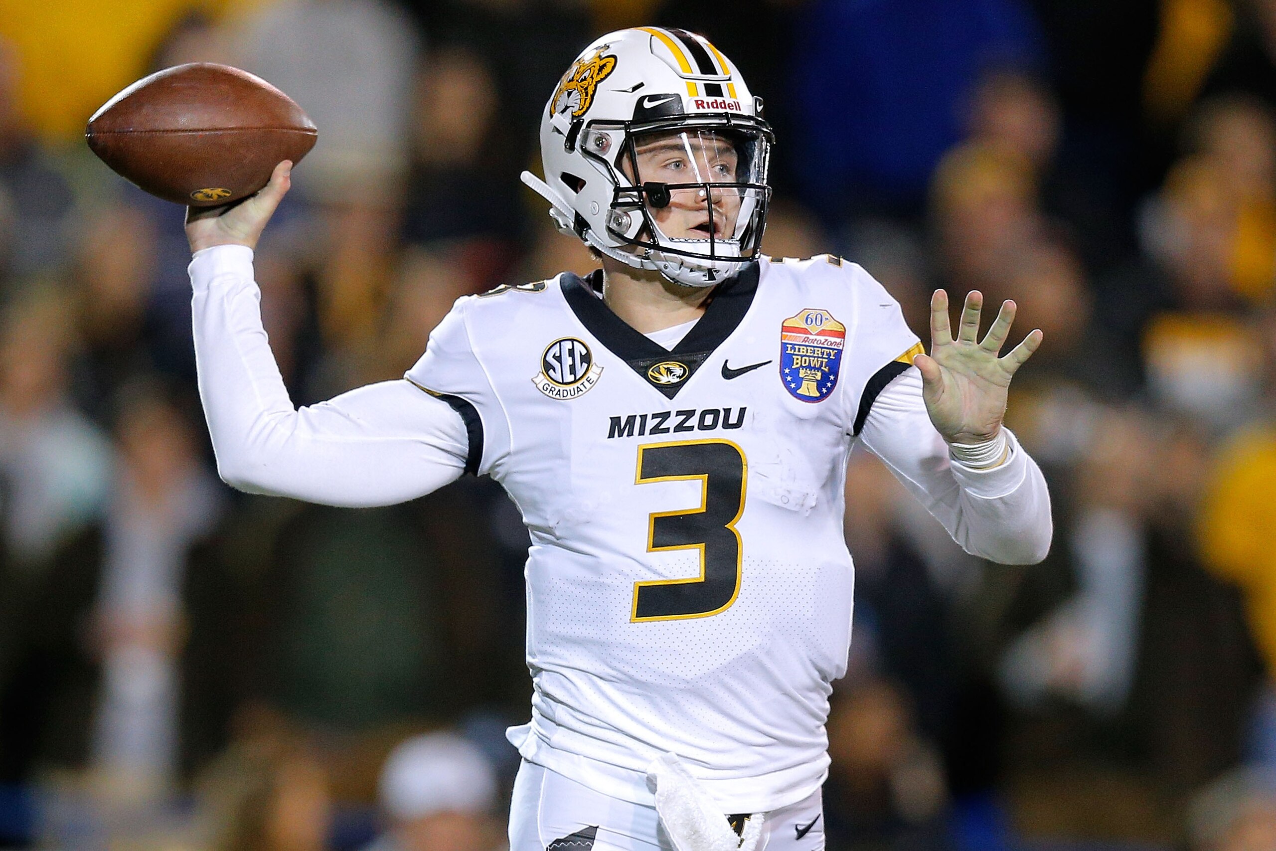 MEMPHIS, TENNESSEE - DECEMBER 31: Drew Lock #3 of the Missouri Tigers throws the ball during the AutoZone Liberty Bowl  against the Oklahoma State Cowboys at the Liberty Bowl Memorial Stadium on December 31, 2018 in Memphis, Tennessee. (Photo by Jonathan 
