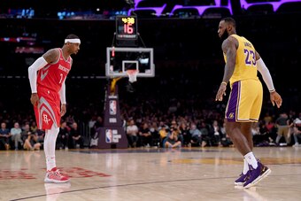 LOS ANGELES, CA - OCTOBER 20:  LeBron James #23 of the Los Angeles Lakers guards Carmelo Anthony #7 of the Houston Rockets during the second quarter at Staples Center on October 20, 2018 in Los Angeles, California.  (Photo by Harry How/Getty Images)
