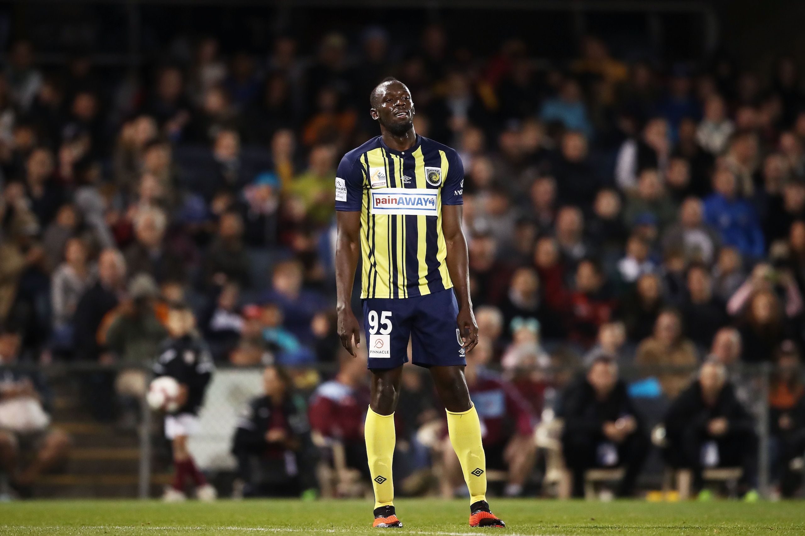 SYDNEY, AUSTRALIA - OCTOBER 12:  Usain Bolt of the Mariners looks on during the pre-season friendly match between the Central Coast Mariners and Macarthur South West United at Campbelltown Sports Stadium on October 12, 2018 in Sydney, Australia.  (Photo b