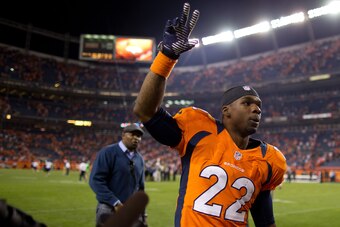 DENVER, CO - SEPTEMBER 9:  Cornerback Tracy Porter #22 of the Denver Broncos celebrates as he runs off the field after defeating the Pittsburgh Steelers 31-19 at Sports Authority Field Field at Mile High on September 9, 2012 in Denver, Colorado.  (Photo b