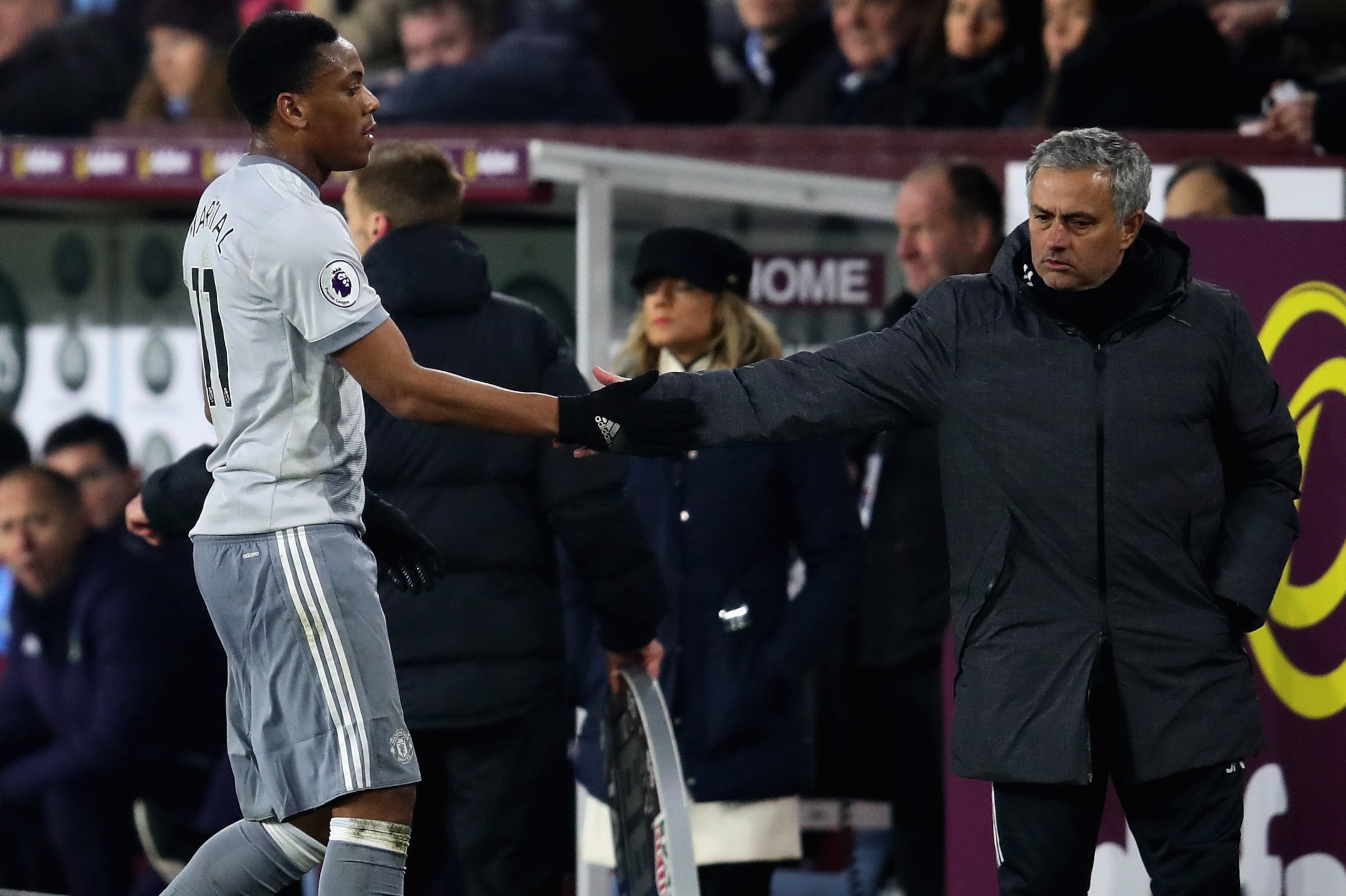 BURNLEY, ENGLAND - JANUARY 20: Jose Mourinho, Manager of Manchester United shakes hands with goalscorer Anthony Martial of Manchester United as he is substituted during the Premier League match between Burnley and Manchester United at Turf Moor on January BURNLEY, ENGLAND - JANUARY 20: Jose Mourinho, Manager of Manchester United shakes hands with goalscorer Anthony Martial of Manchester United as he is substituted during the Premier League match between Burnley and Manchester United at Turf Moor on January