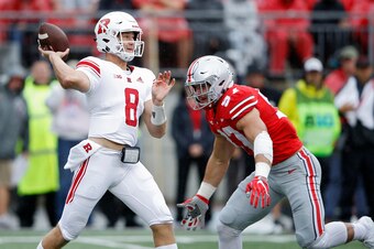COLUMBUS, OH - SEPTEMBER 08: Artur Sitkowski #8 of the Rutgers Scarlet Knights throws a pass while under pressure from Nick Bosa #97 of the Ohio State Buckeyes in the first quarter of the game at Ohio Stadium on September 8, 2018 in Columbus, Ohio. (Photo