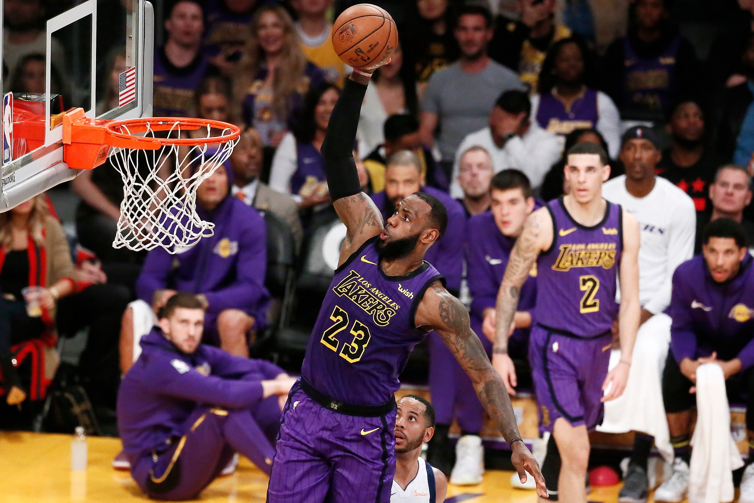 LOS ANGELES, CA - NOVEMBER 30: LeBron James #23 of the Los Angeles Lakers drives to the basket against the Dallas Mavericks on November 30, 2018 at the Staples Center in Los Angeles, California. NOTE TO USER: User expressly acknowledges and agrees that, LOS ANGELES, CA - NOVEMBER 30: LeBron James #23 of the Los Angeles Lakers drives to the basket against the Dallas Mavericks on November 30, 2018 at the Staples Center in Los Angeles, California. NOTE TO USER: User expressly acknowledges and agrees that,