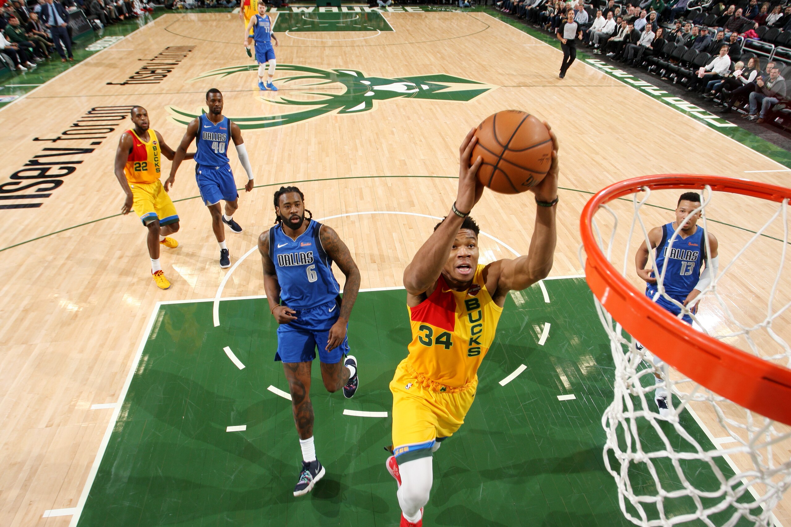 MILWAUKEE, WI - JANUARY 21: Giannis Antetokounmpo #34 of the Milwaukee Bucks dunks the ball against the Dallas Mavericks on January 21, 2019 at the Fiserv Forum Center in Milwaukee, Wisconsin. NOTE TO USER: User expressly acknowledges and agrees that, by MILWAUKEE, WI - JANUARY 21: Giannis Antetokounmpo #34 of the Milwaukee Bucks dunks the ball against the Dallas Mavericks on January 21, 2019 at the Fiserv Forum Center in Milwaukee, Wisconsin. NOTE TO USER: User expressly acknowledges and agrees that, by