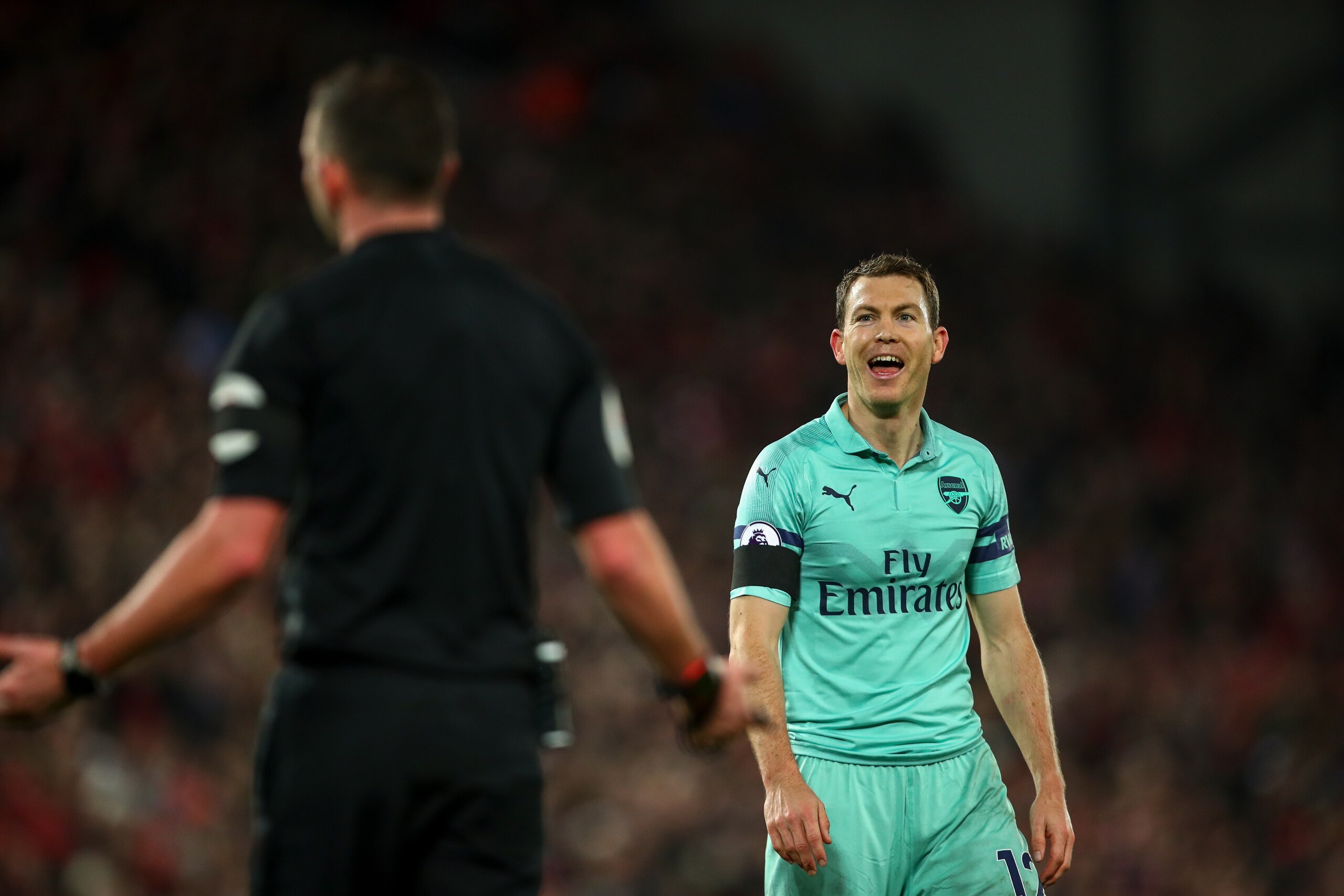 LIVERPOOL, ENGLAND - DECEMBER 29: Stephan Lichtsteiner of Arsenal reacts during the Premier League match between Liverpool FC and Arsenal FC at Anfield on December 29, 2018 in Liverpool, United Kingdom. (Photo by Robbie Jay Barratt - AMA/Getty Images) LIVERPOOL, ENGLAND - DECEMBER 29: Stephan Lichtsteiner of Arsenal reacts during the Premier League match between Liverpool FC and Arsenal FC at Anfield on December 29, 2018 in Liverpool, United Kingdom. (Photo by Robbie Jay Barratt - AMA/Getty Images)