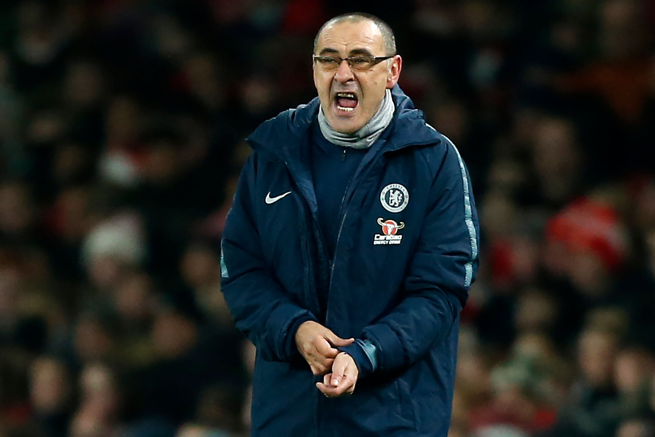 Chelsea's Italian head coach Maurizio Sarri gestures on the touchline during the English Premier League football match between Arsenal and Cheslea at the Emirates Stadium in London on January 19, 2019. (Photo by Ian KINGTON / IKIMAGES / AFP) / RESTRICTED Chelsea's Italian head coach Maurizio Sarri gestures on the touchline during the English Premier League football match between Arsenal and Cheslea at the Emirates Stadium in London on January 19, 2019. (Photo by Ian KINGTON / IKIMAGES / AFP) / RESTRICTED