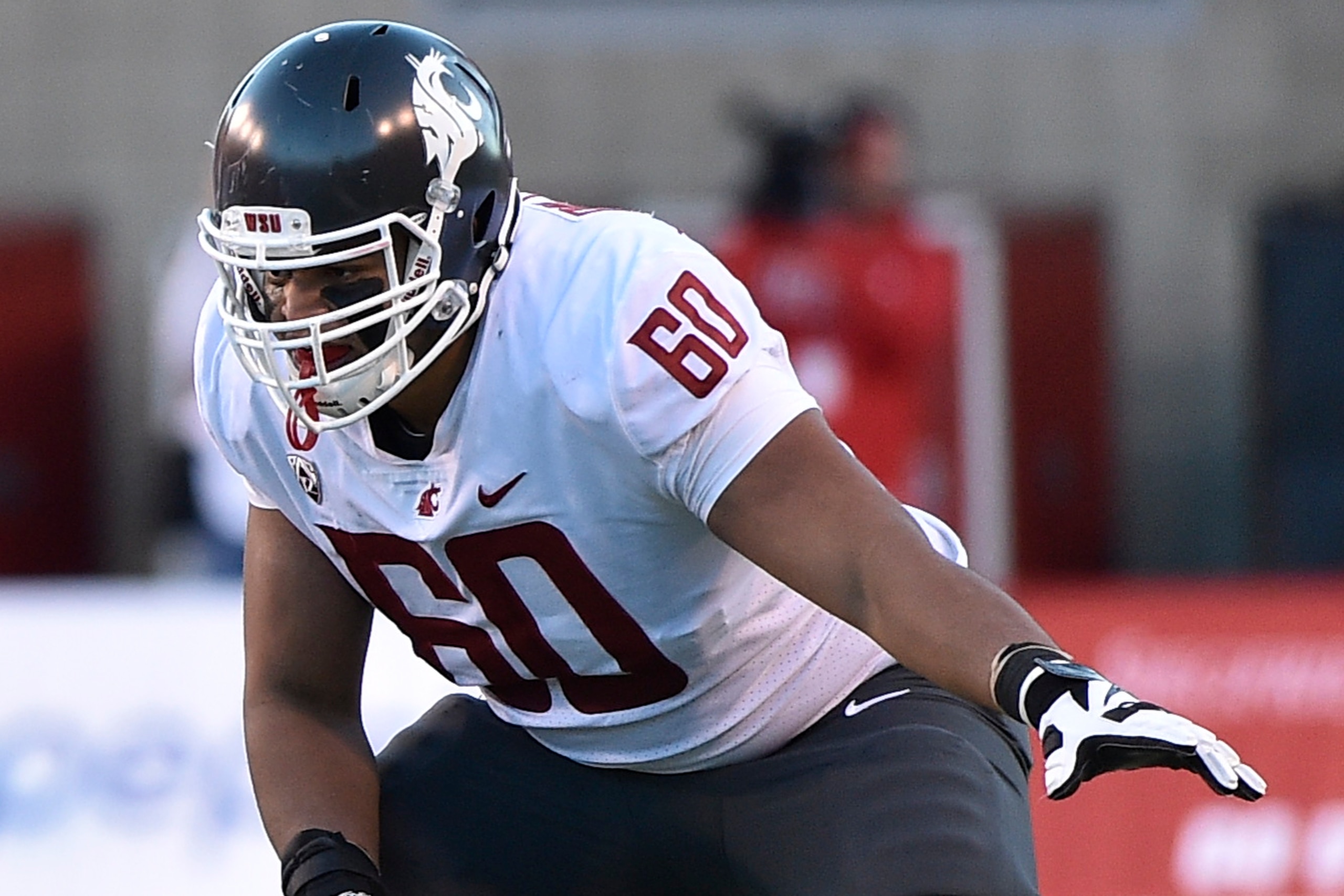 SALT LAKE CITY, UT - NOVEMBER 11: Andre Dillard #60 of the Washington State Cougars in his stance at the line of scrimmage during their game against the Utah Utes at Rice-Eccles Stadium on November 11, 2017 in Salt Lake City, Utah. (Photo by Gene Sweeney 