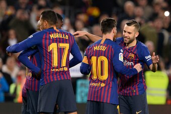 Barcelona's Argentinian forward Lionel Messi (2R) celebrates his goal with teammates during the Spain's Copa del Rey (King's Cup) round of 16 second leg football match between FC Barcelona and Levante UD, at the Camp Nou stadium in Barcelona on January 17