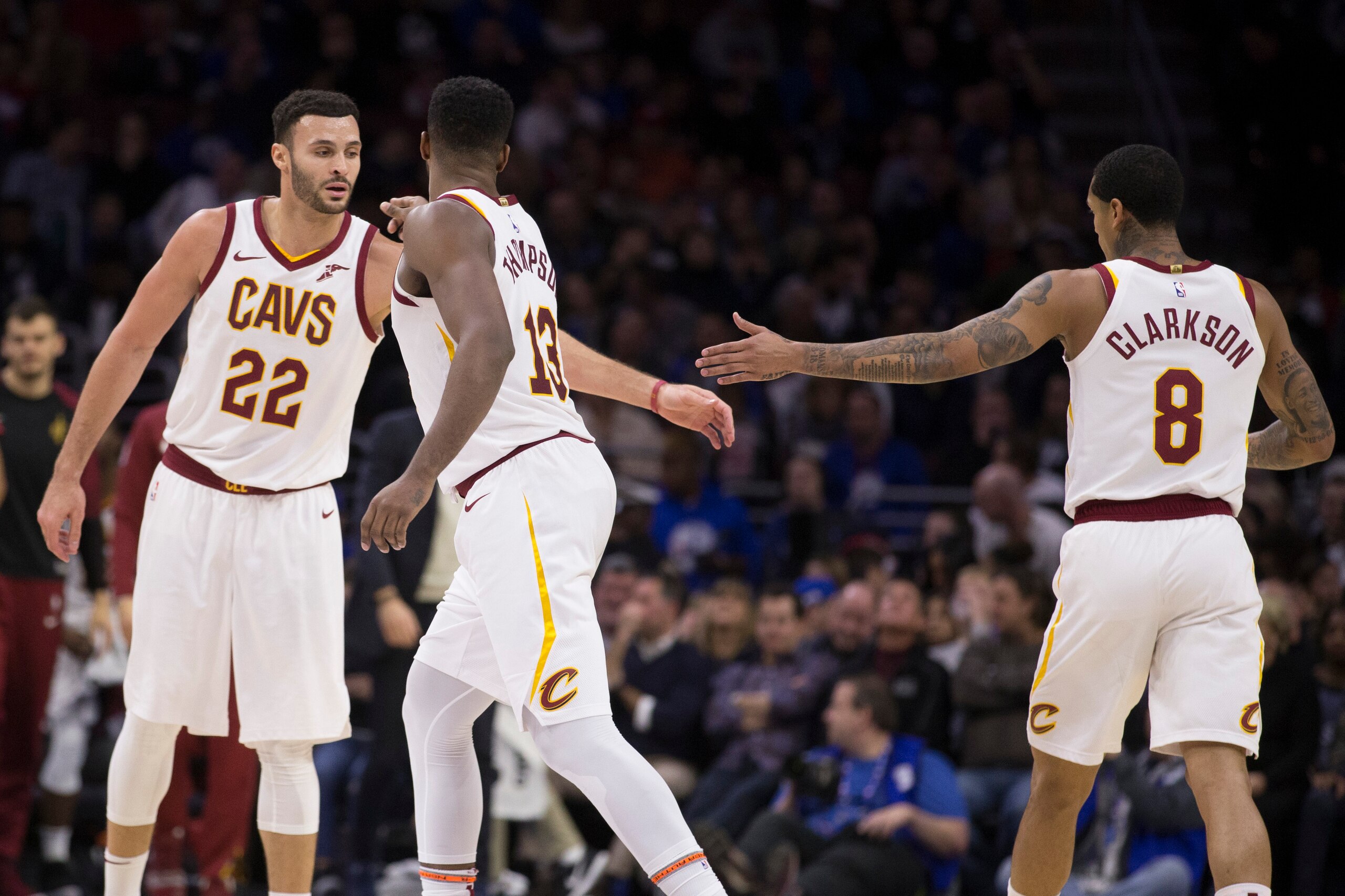 PHILADELPHIA, PA - NOVEMBER 23: Larry Nance Jr. #22, Tristan Thompson #13, and Jordan Clarkson #8 of the Cleveland Cavaliers celebrate against the Philadelphia 76ers at the Wells Fargo Center on November 23, 2018 in Philadelphia, Pennsylvania. NOTE TO USE