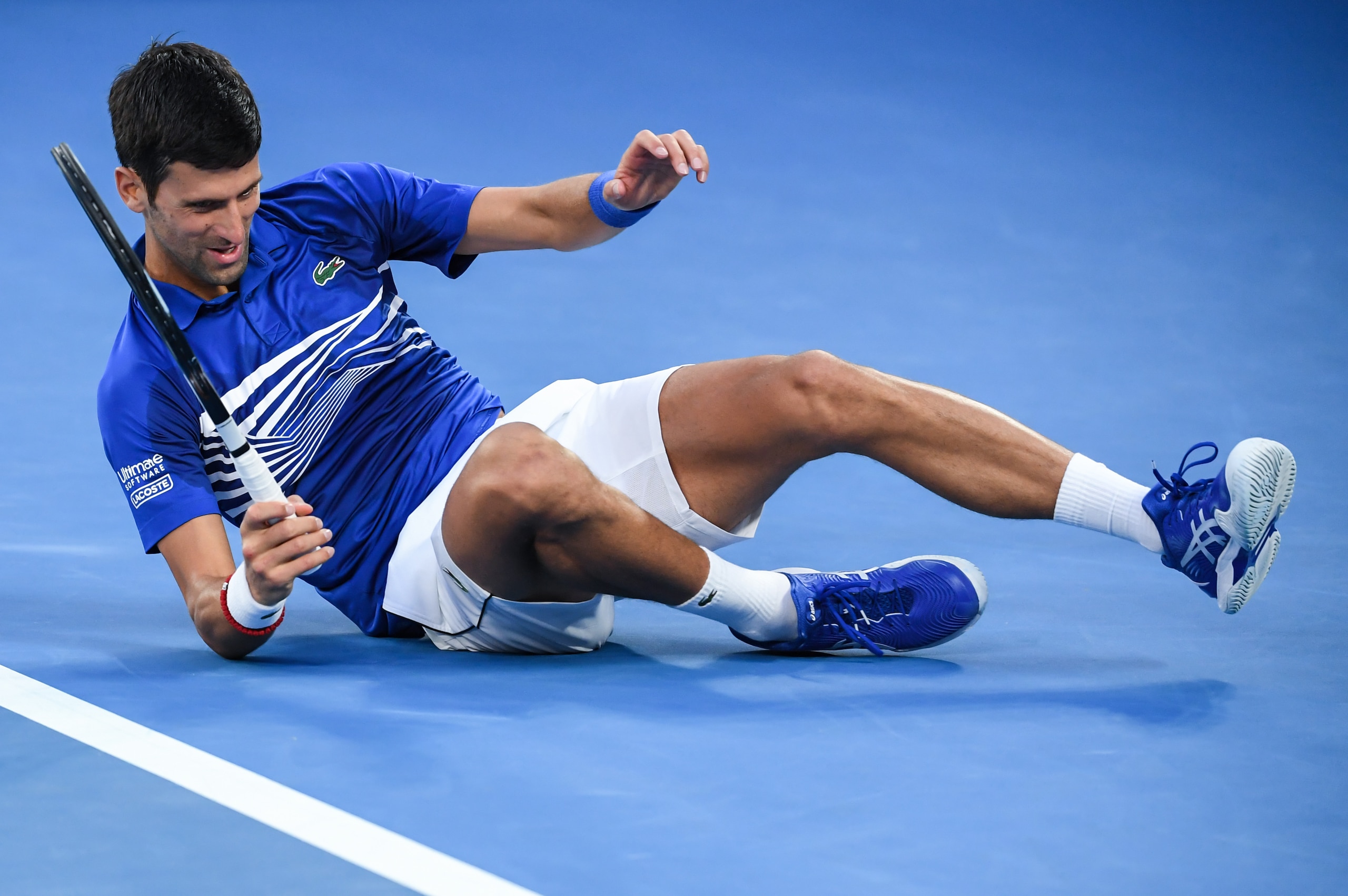 MELBOURNE, AUSTRALIA - JANUARY 25: Novak Djokovic of Serbia on court during his men's semi final match against Lucas Pouille of France during day 12 of the 2019 Australian Open at Melbourne Park on January 25, 2019 in Melbourne, Australia. (Photo by James MELBOURNE, AUSTRALIA - JANUARY 25: Novak Djokovic of Serbia on court during his men's semi final match against Lucas Pouille of France during day 12 of the 2019 Australian Open at Melbourne Park on January 25, 2019 in Melbourne, Australia. (Photo by James